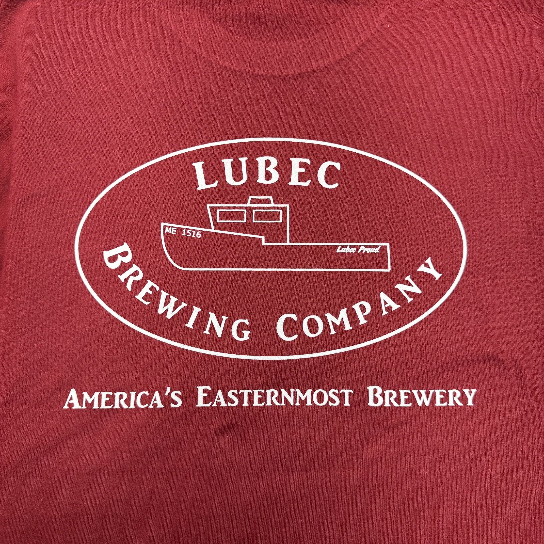 Red shirt with white circular logo featuring the word 'LUBEC' and a graphic of a building, along with text promoting a brewery and auto repair.