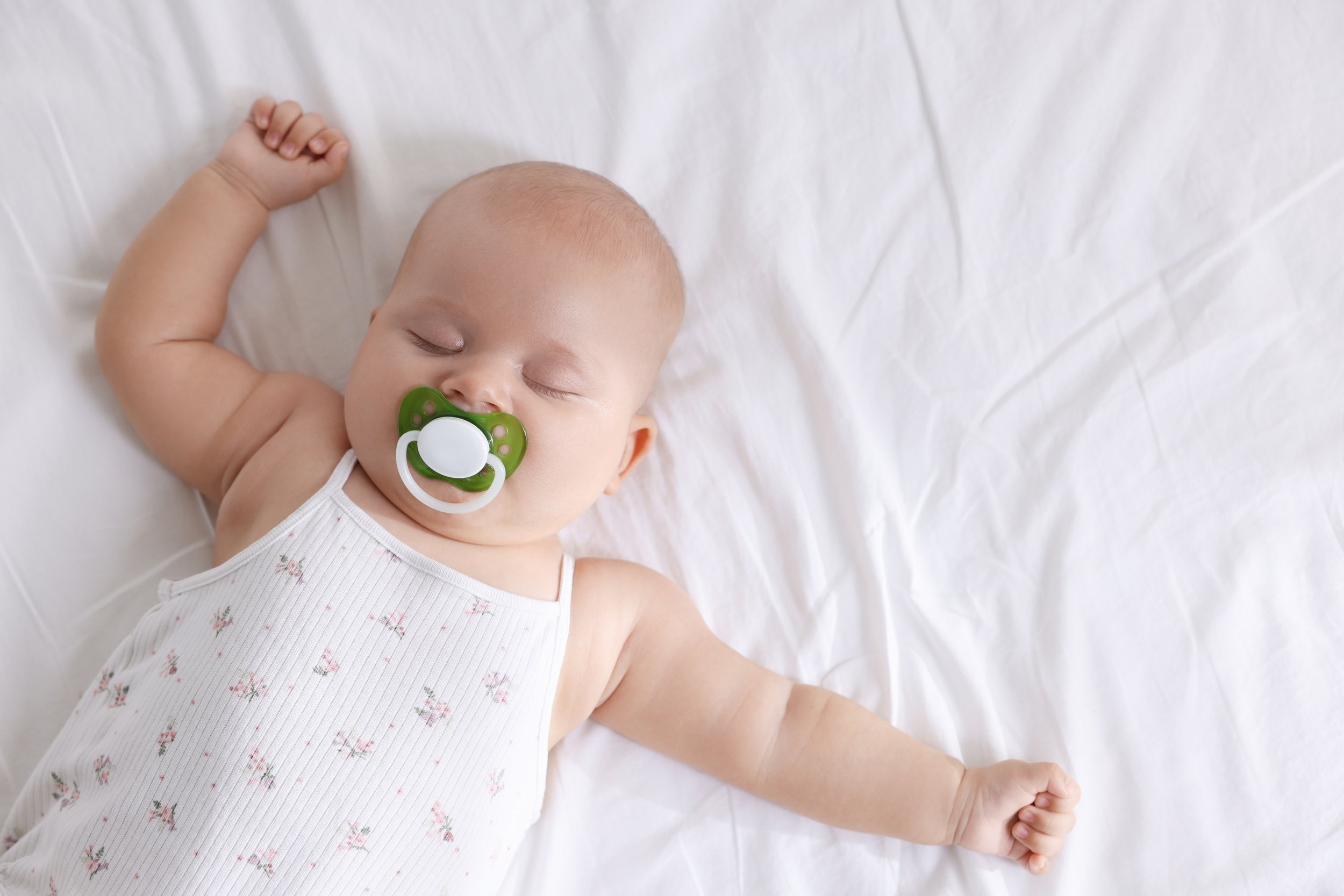 Navigating baby sleep transitions:&nbsp; from swaddle to sleep sack to toddler bed