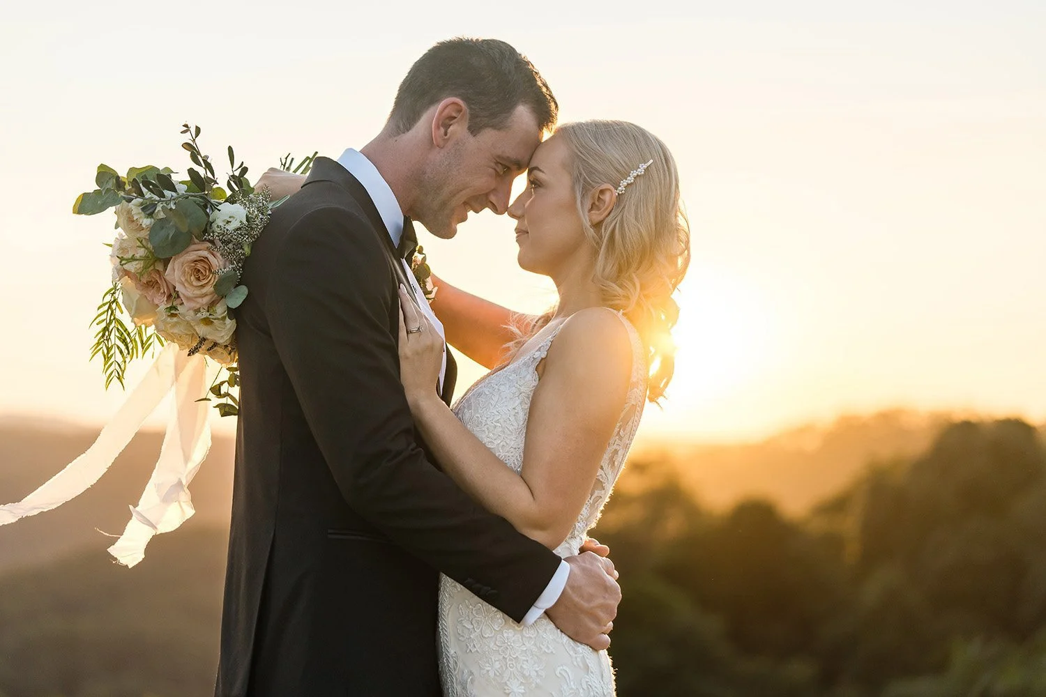 bride and groom at sunset at popular wedding venue