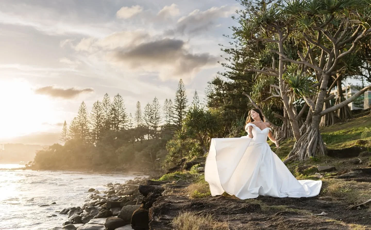 I still have to pinch myself every day that I get to live and work in this beautiful corner of the world! Growing up in Caloundra, I’ve always loved the sunshine, the sea breeze, and those magical golden-hour views that make weddings here feel