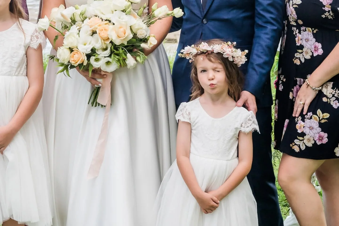 Can we just take a moment for this little flower girl?&nbsp;😂💕

While everyone else was standing nicely for the family photo, she decided it was the perfect time to show off her sass and personality... and honestly, I love it!

These are the moment