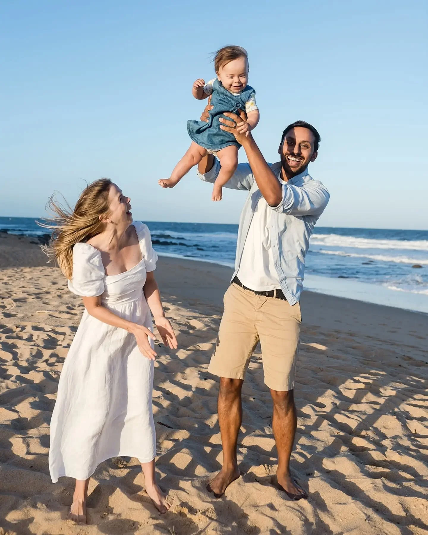 Sometimes the best family photos happen when you simply play.

No perfect poses. No pressure. Just big smiles, little giggles and making memories together.

These are the moments you'll treasure forever.

Love natural, joy-filled family photos? Come 