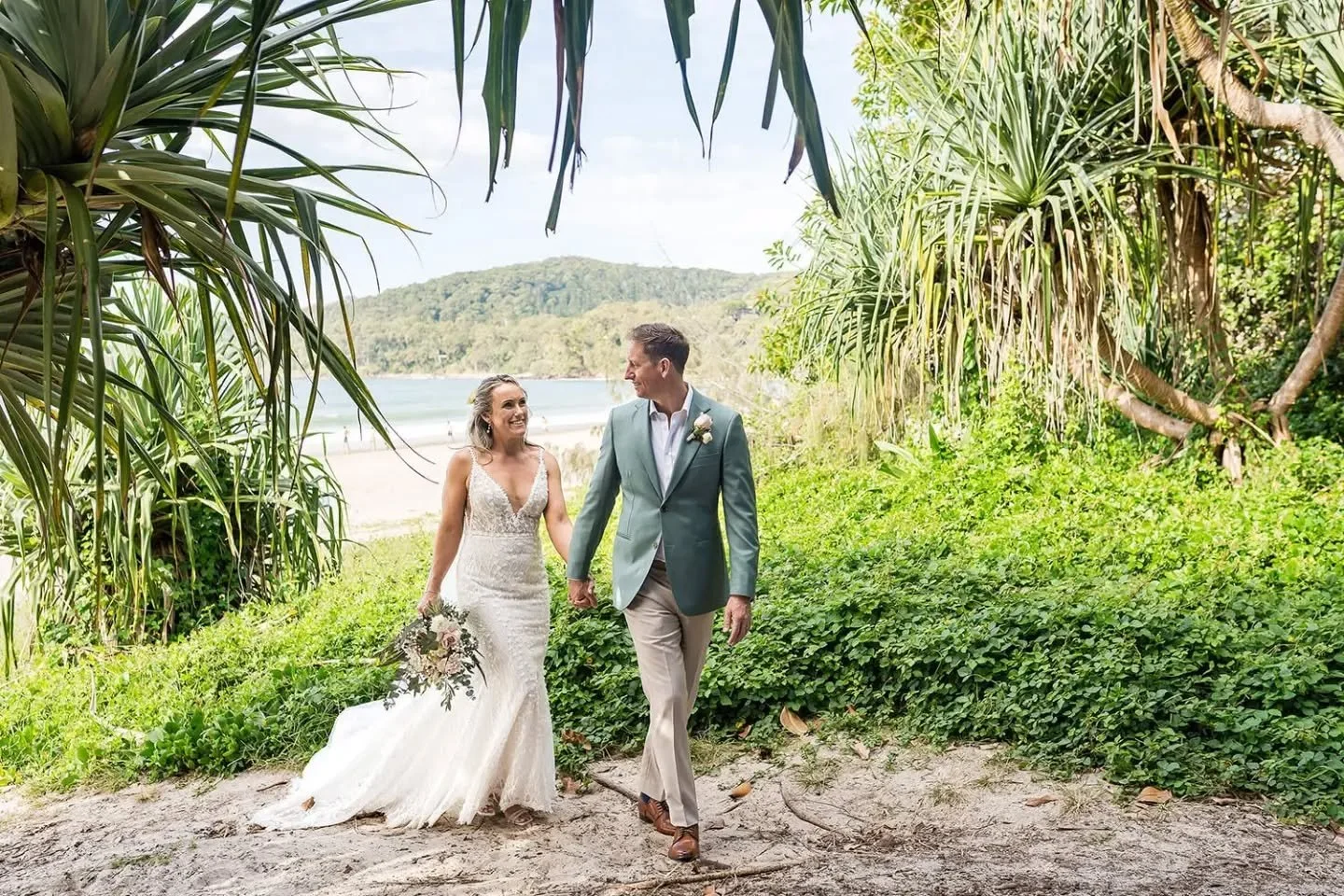 Dreaming of a beach wedding on the Sunshine Coast? Here's something most couples ask...

"Will we have to spend ages away from our guests to get beautiful photos?"

Not at all!

One of the biggest advantages of getting married on the Sunshi
