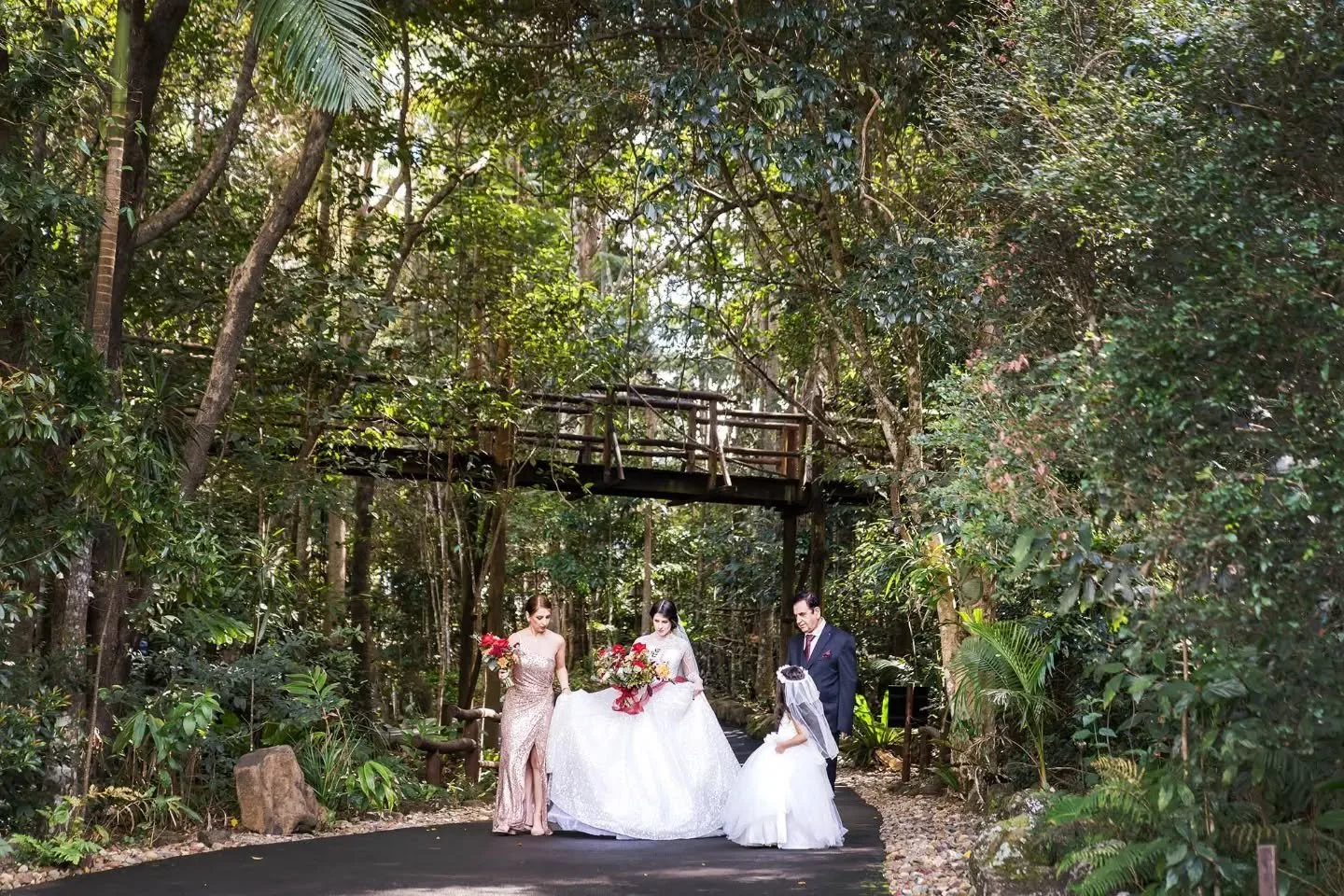 There&rsquo;s something really special about the walk to your wedding ceremony.

Beautiful Elnaz made her way from her treetop cabin at Secrets on the Lake in Montville, through the lush rainforest gardens with her Dad, sister and niece by her side.
