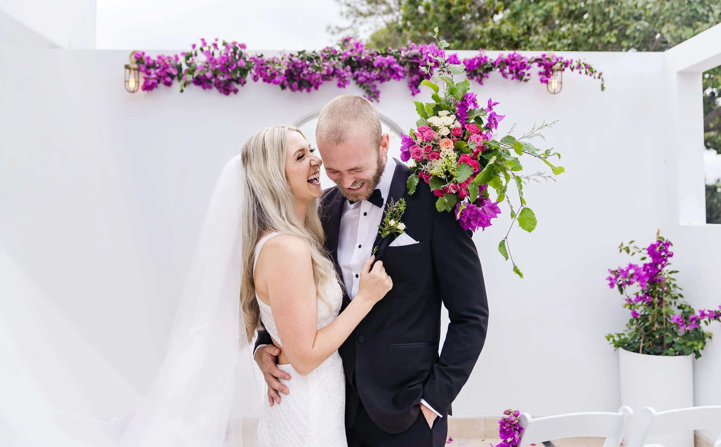 bride & groom share a luagh before their reception