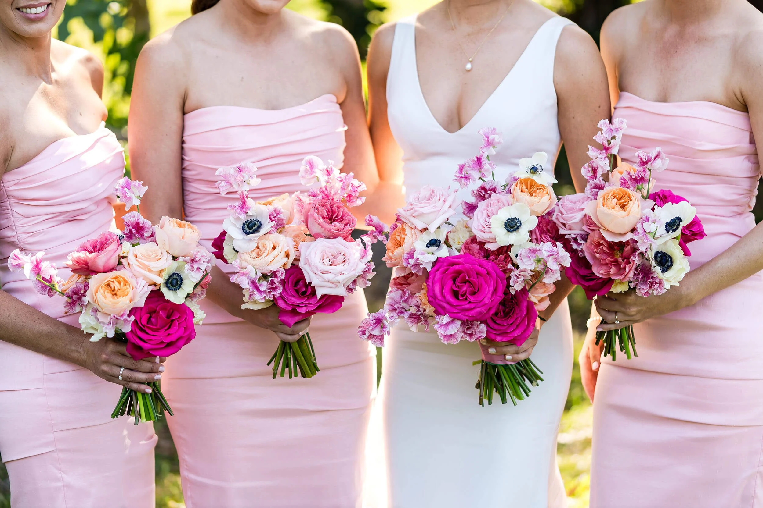 bright bride and bridesmaid flowers
