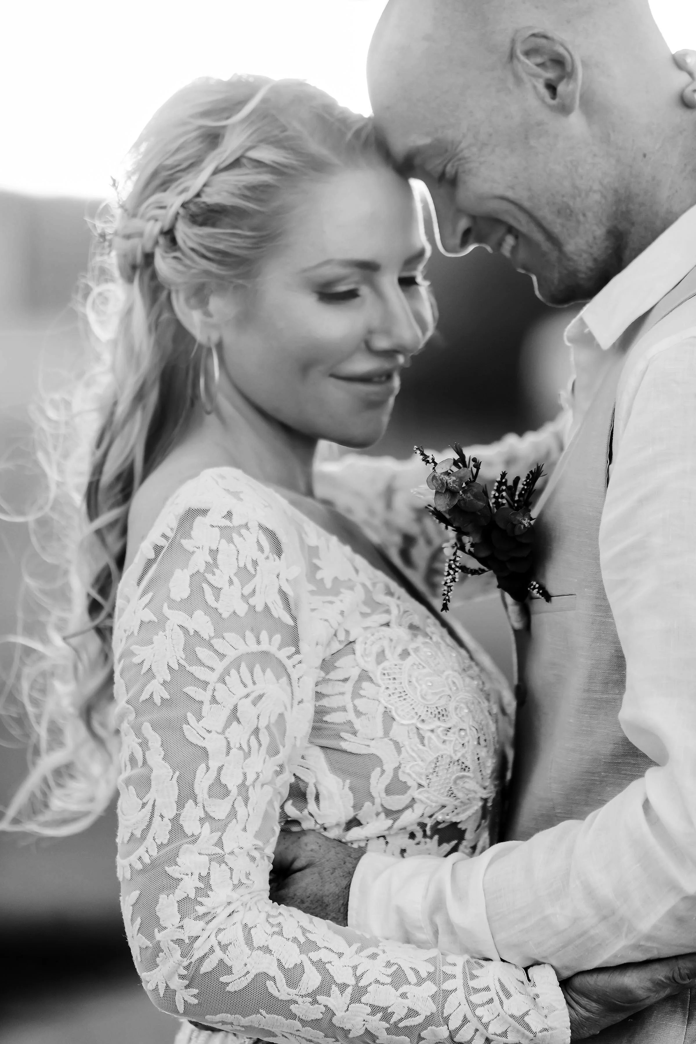 quiet momnet with bride and groom at sunset