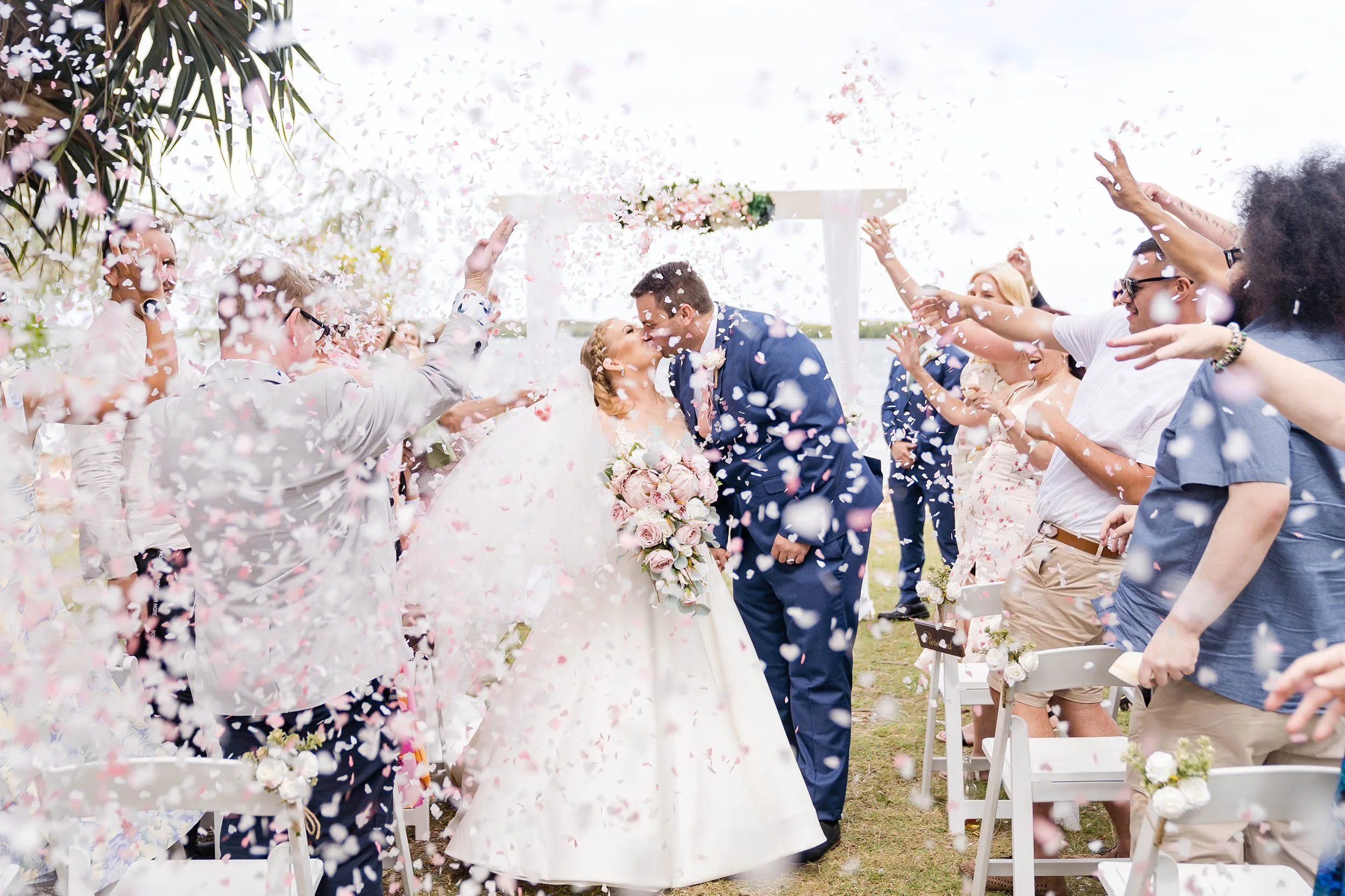 confetti wedding photo with bride and groom