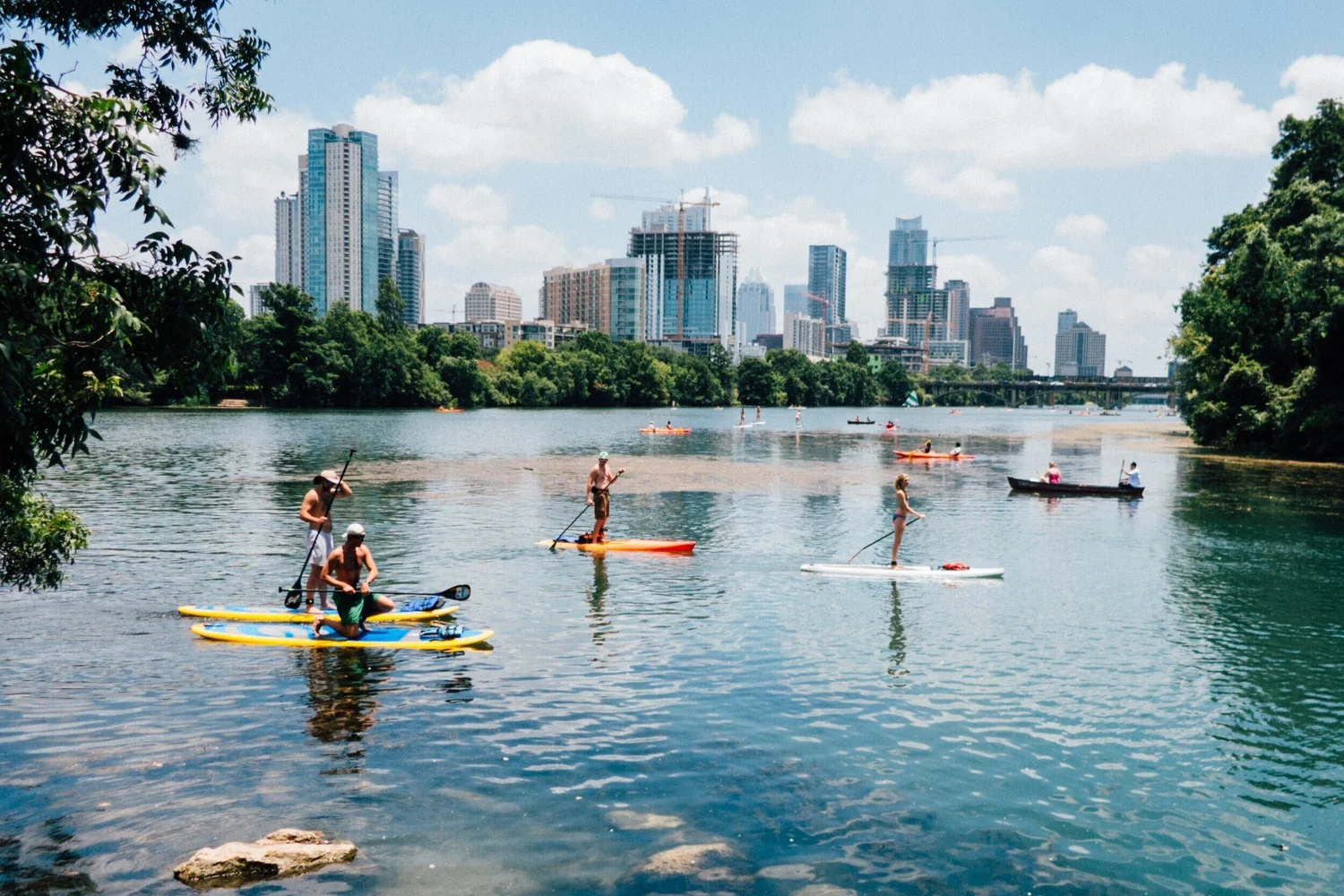 Austin neighborhood water scene representing the local East Austin connection