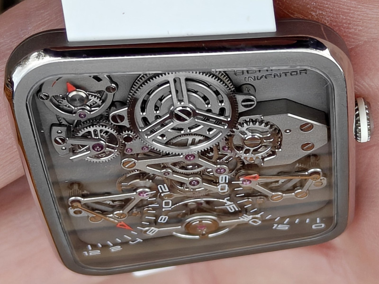 Behrens Ultralight 20G skeletonized dial up close in hand