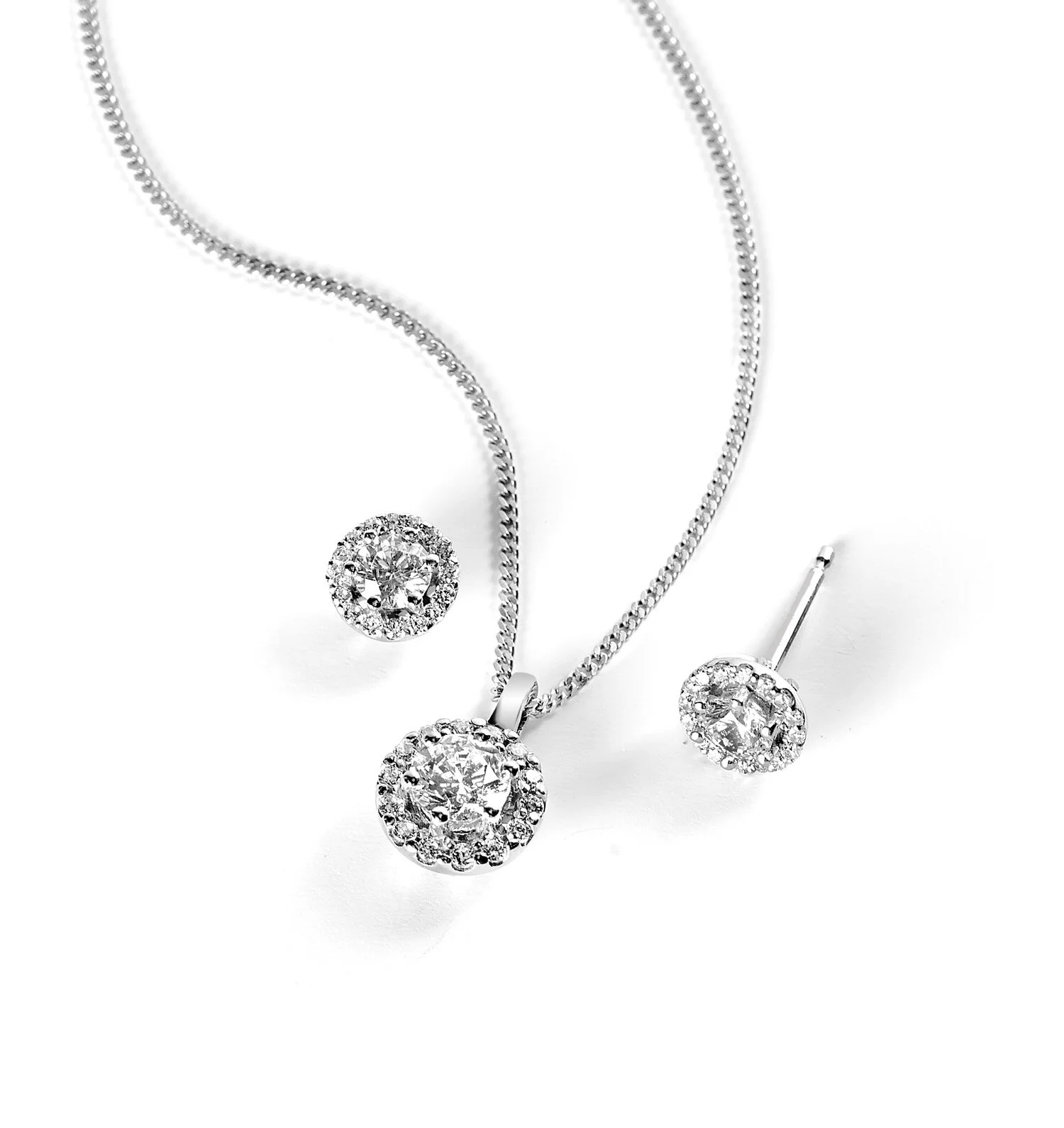 Diamond cluster earrings and pendant   Available in 9ct and 18ct white, yellow or rose gold.  Varying diamond weights.  Sold separately or as a set.     Price from £850