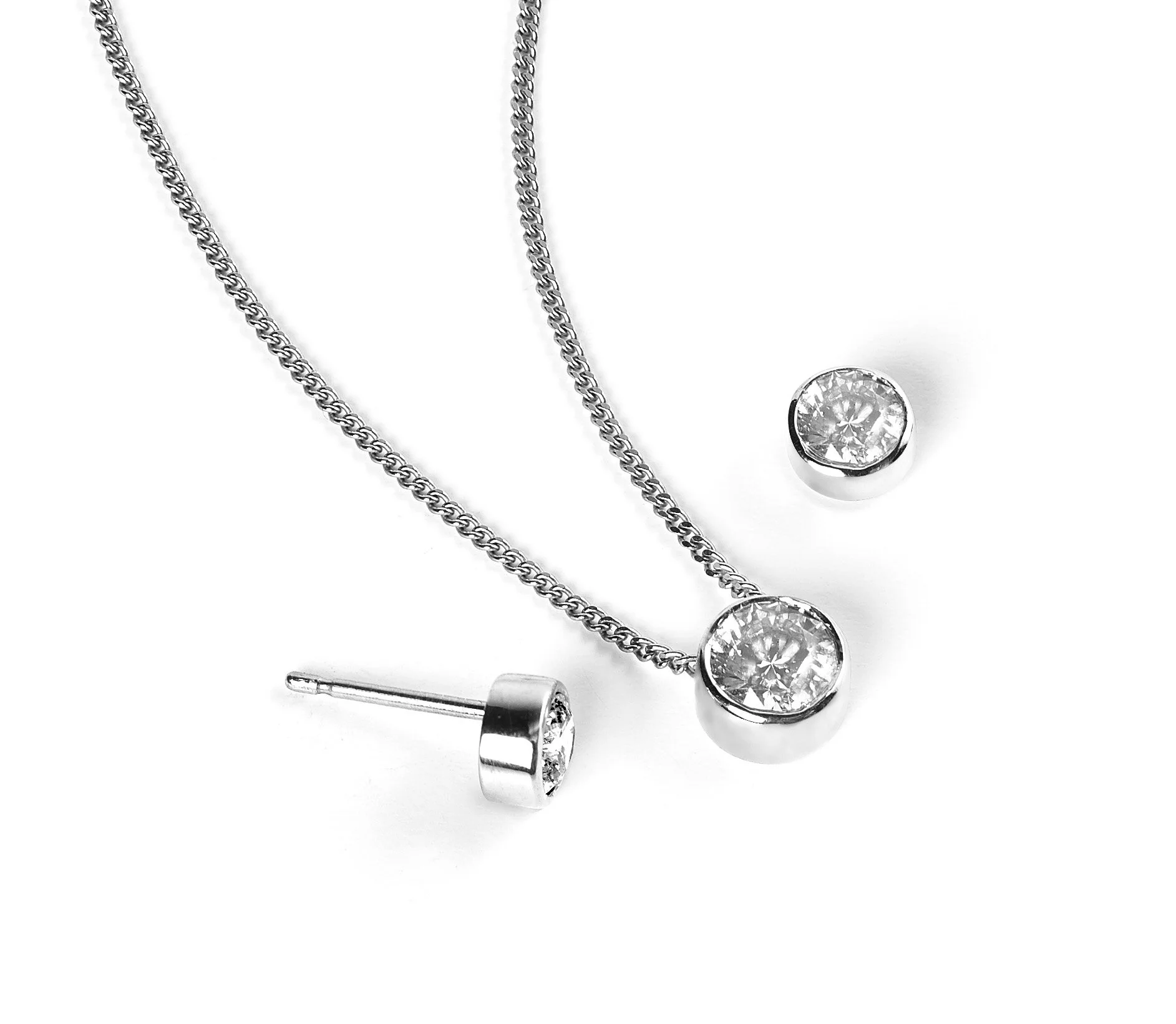 Diamond rub over earrings and pendant   Available in 9ct and 18ct white, or yellow gold.  Varying diamond weights.  Sold separately or as a set.     Price from £175