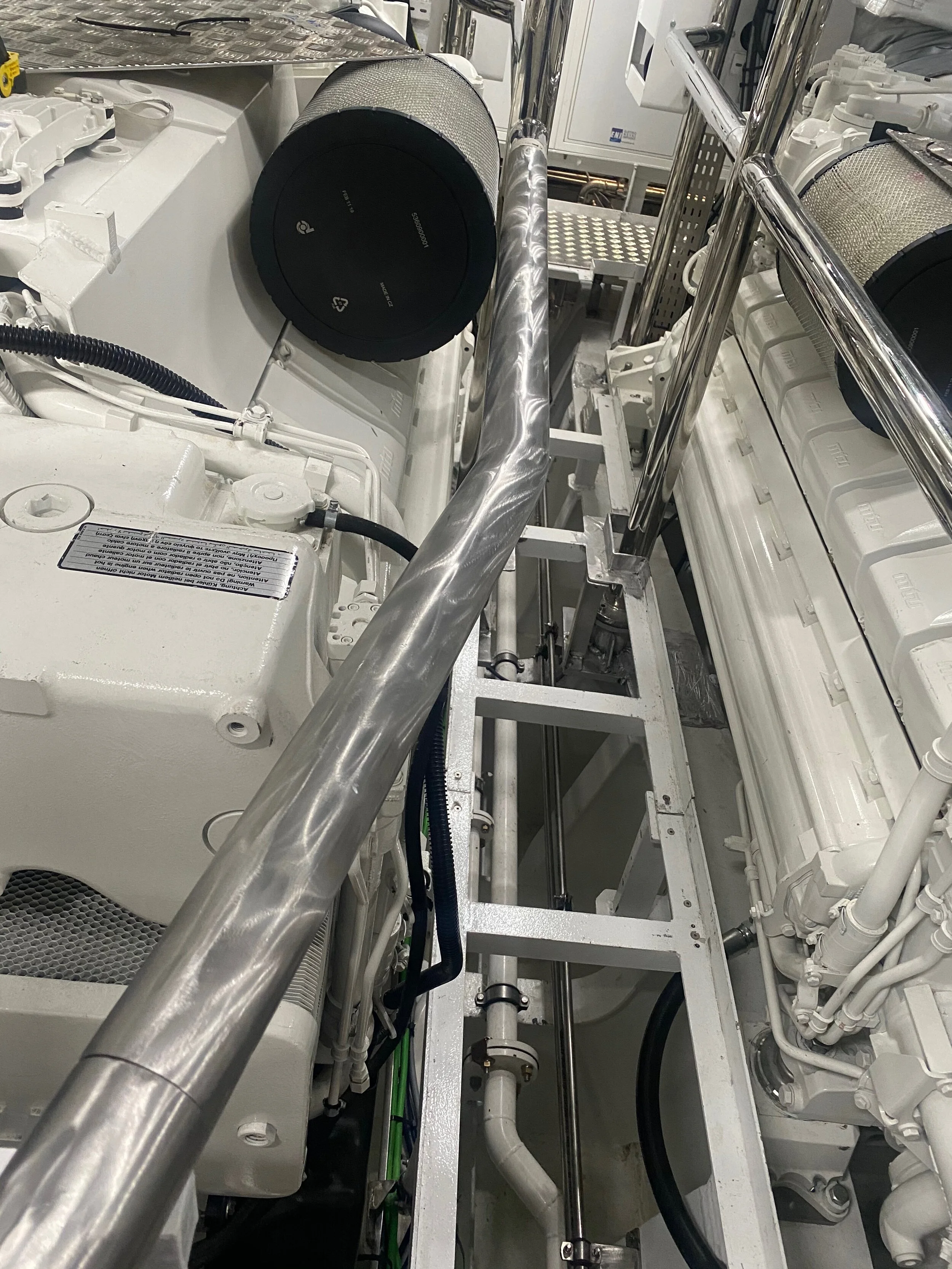 Guard rails around engine room being polished