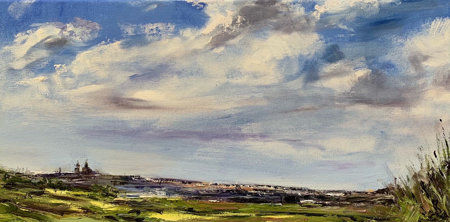 Gozitan countryside, the cloudy sky with a church on the horizon painted vividly with oils.