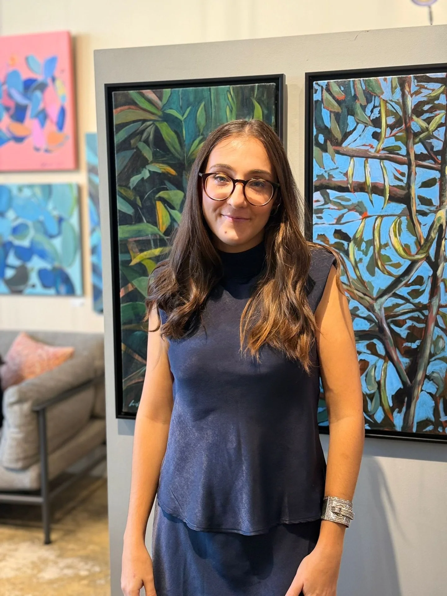 Lisa Cassar with her paintings