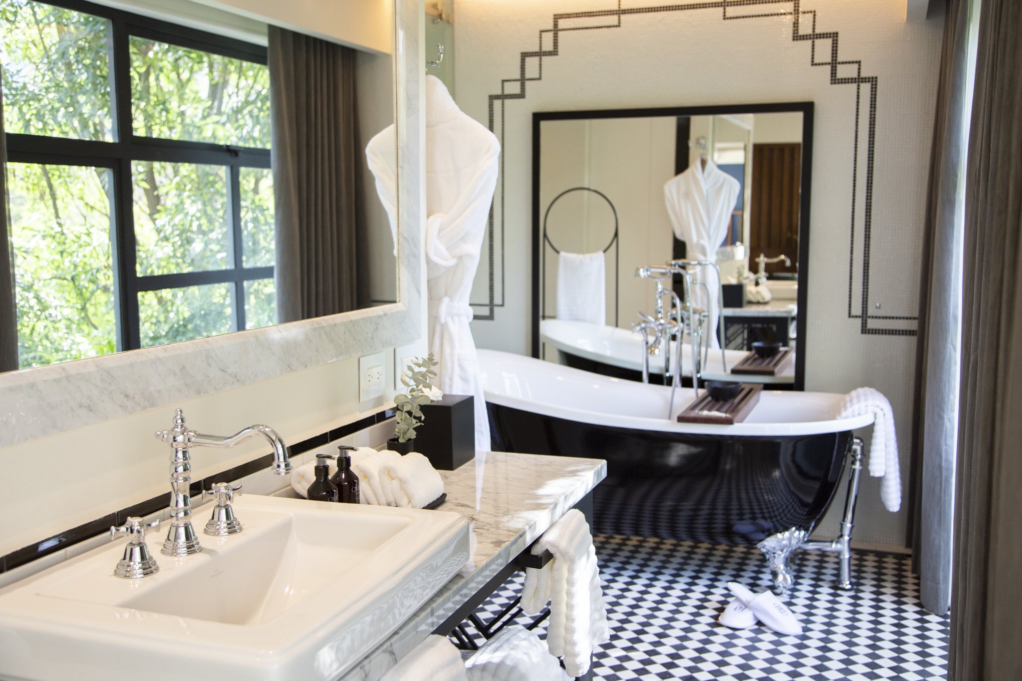 Soak in tub, luxury custom bisazza tile, double shower heads.