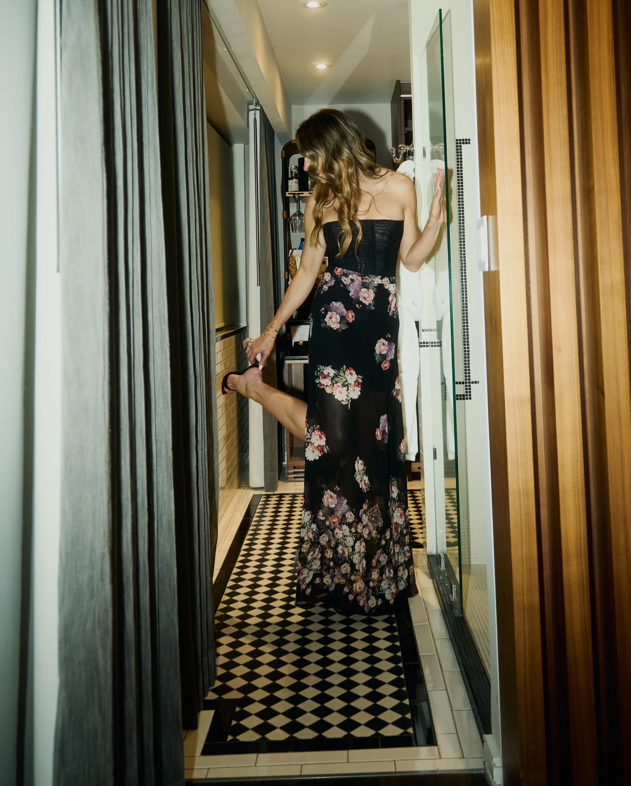 Woman in hotel hallway