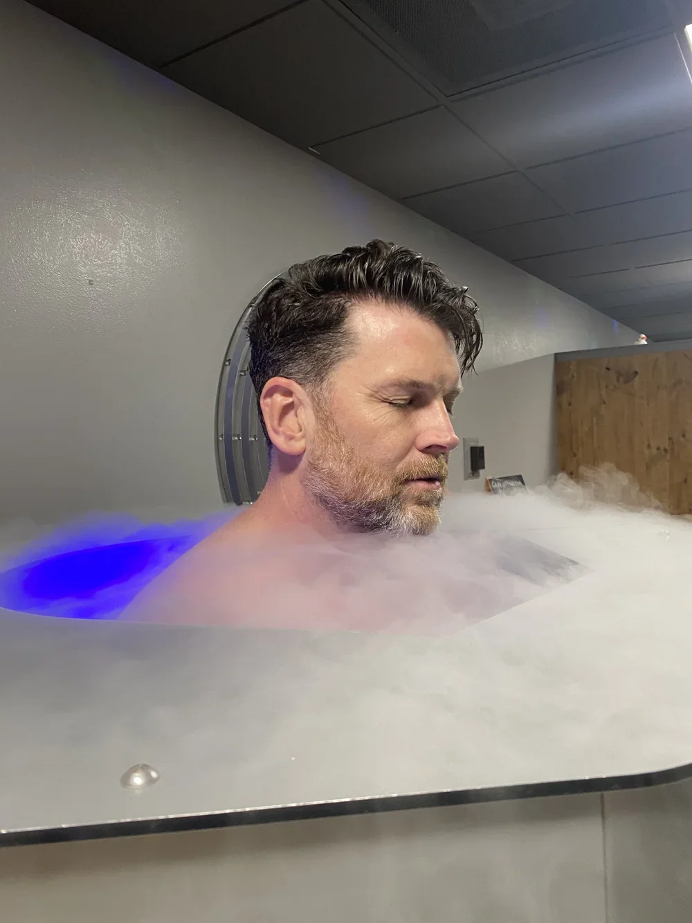 Customer in the cryotherapy chamber at Catskill Cryo