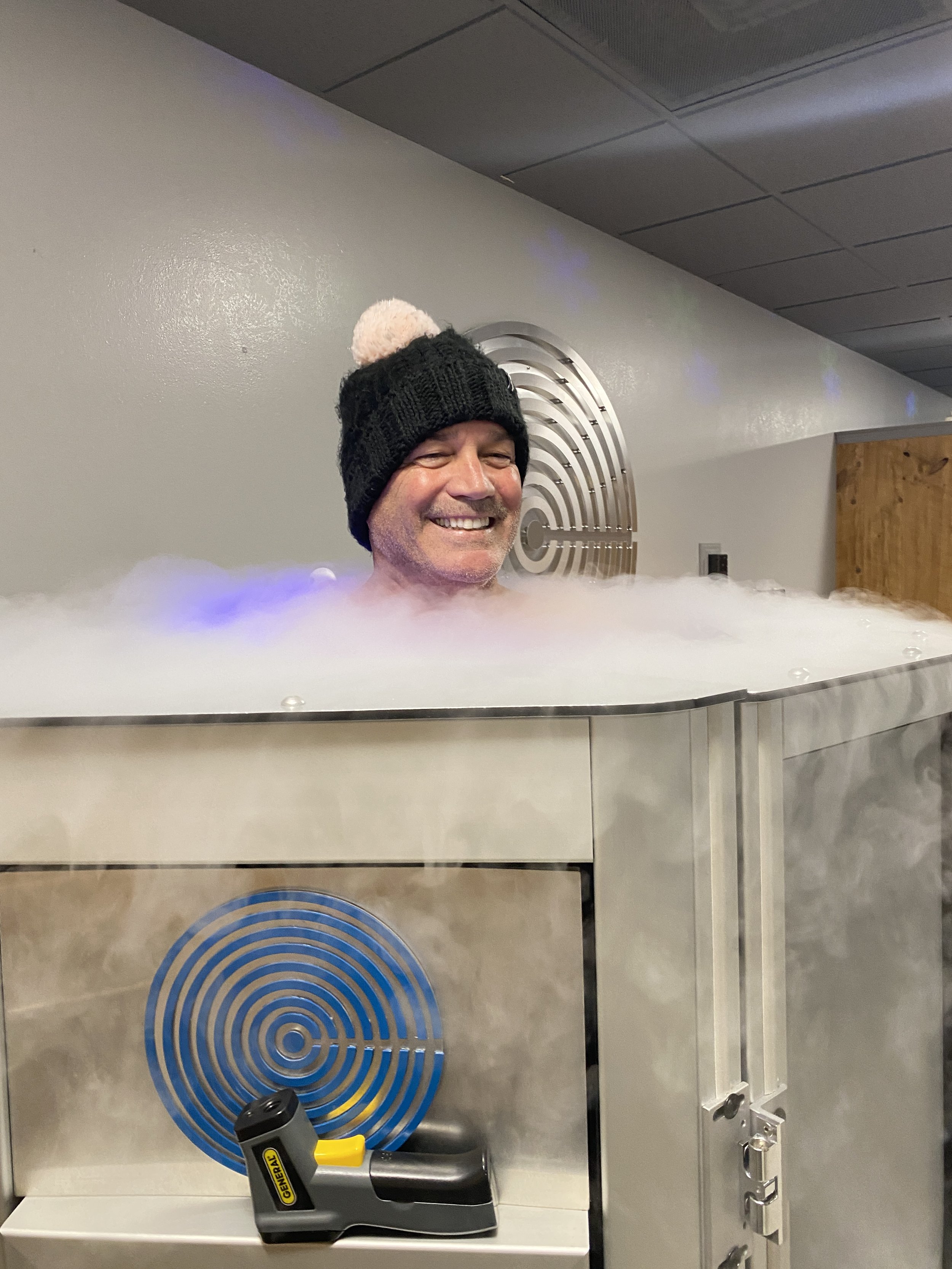Customer in the cryotherapy chamber at Catskill Cryo