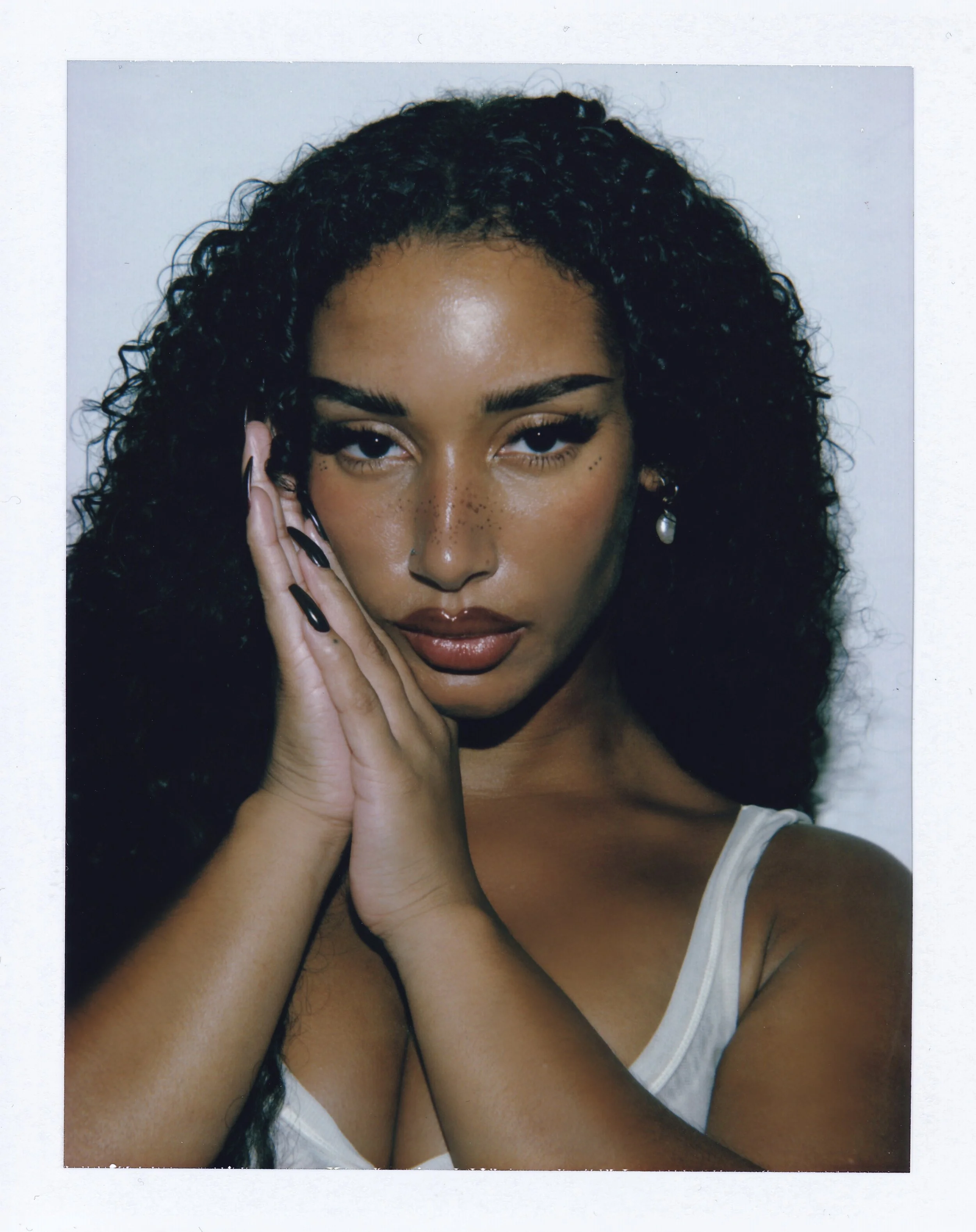 NAOMI SHARON