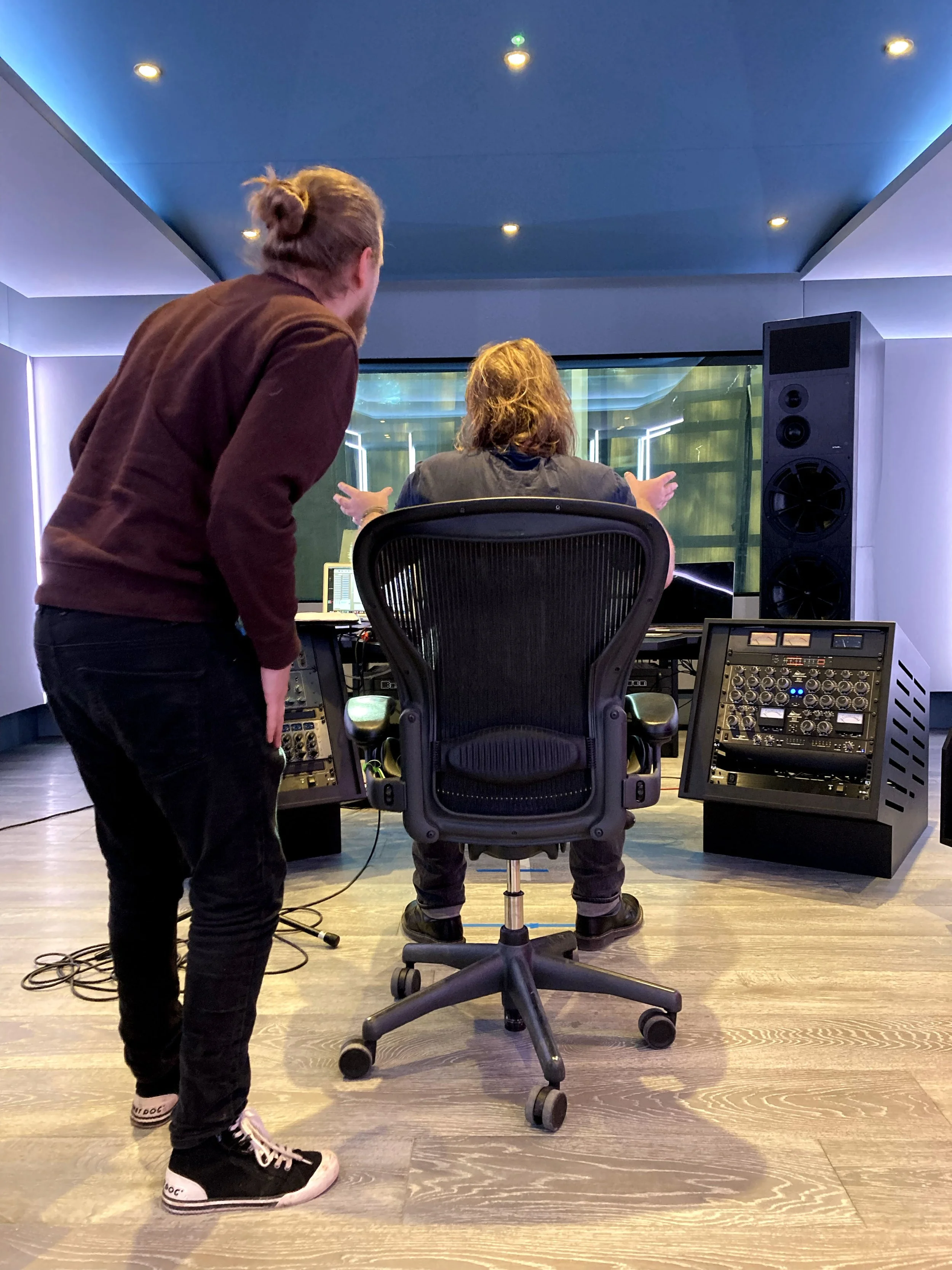 Producer and acoustic engineer at Wired Masters discussing the loudspeaker line-up during commissioning.