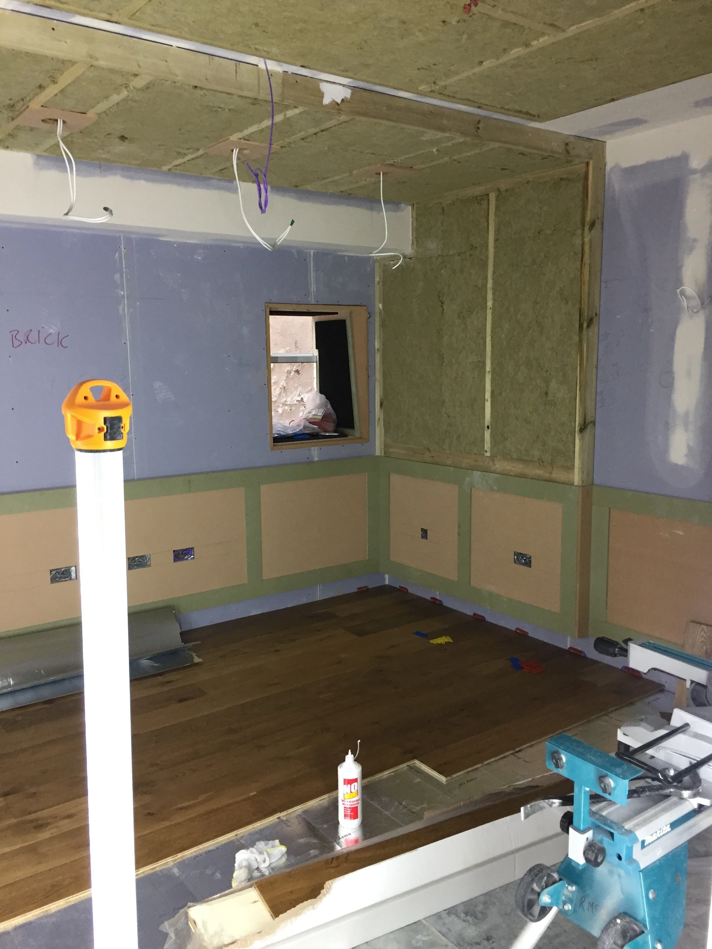 Studio 2 fit-out in progress at The Chappell, Warner Chappell, Kensington, showing timber panelling, front wall treatments and first fix electrics.