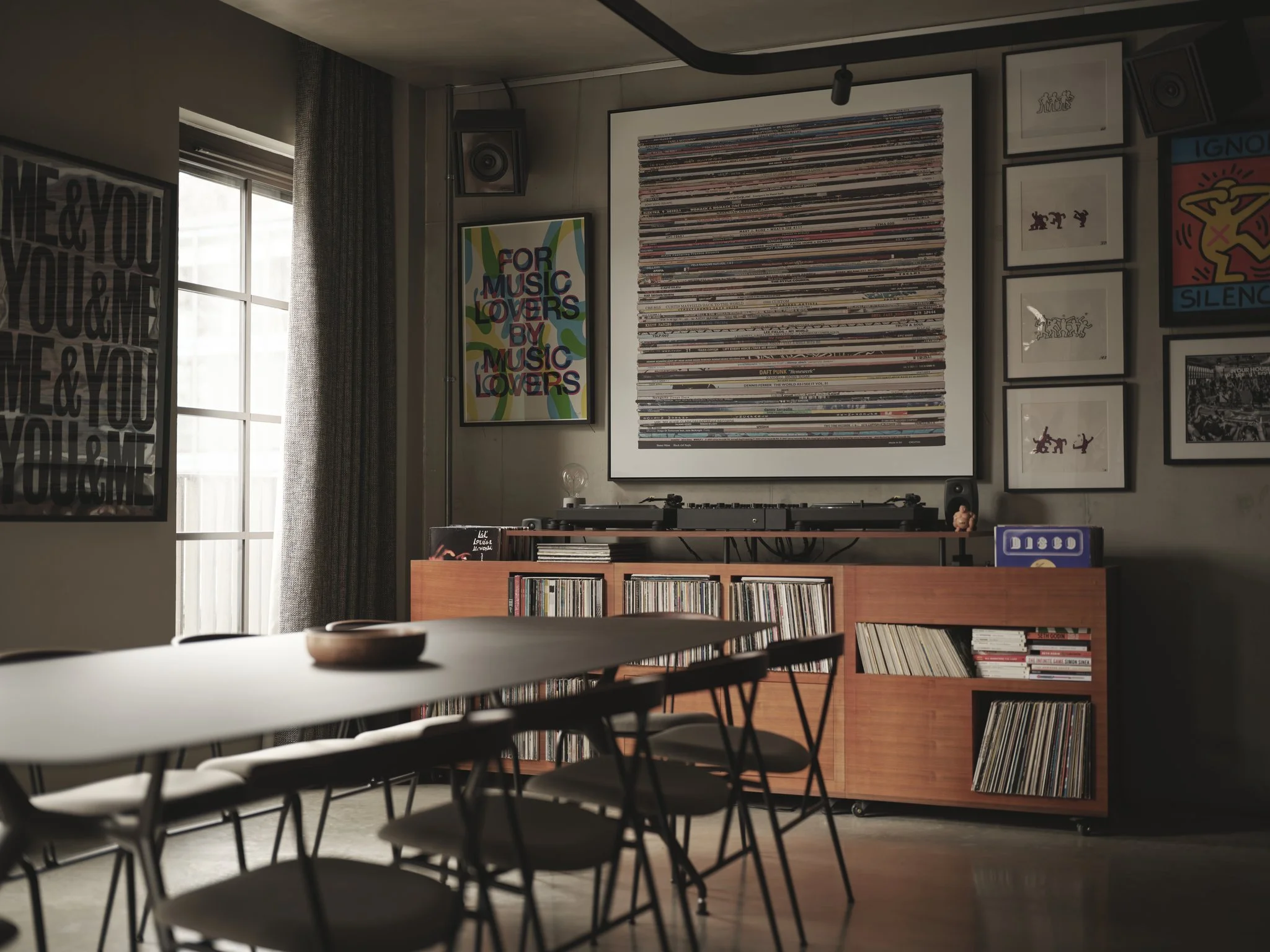 Residential DJ room with bespoke DJ console and vinyl storage, showing Technics turntables and a MasterSounds mixer.
