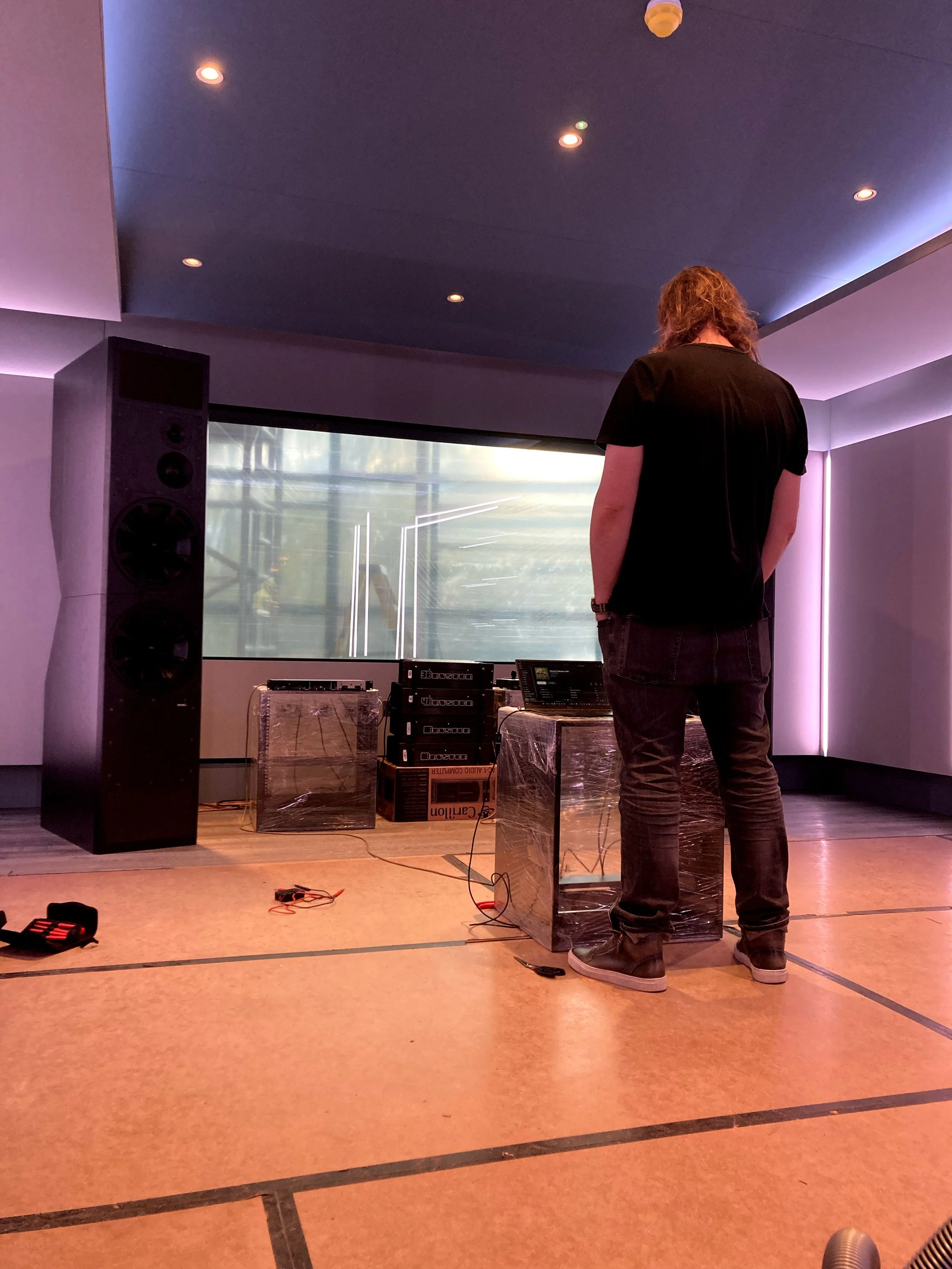 Kevin Grainger at Wired Masters reviewing loudspeaker alignment during commissioning.