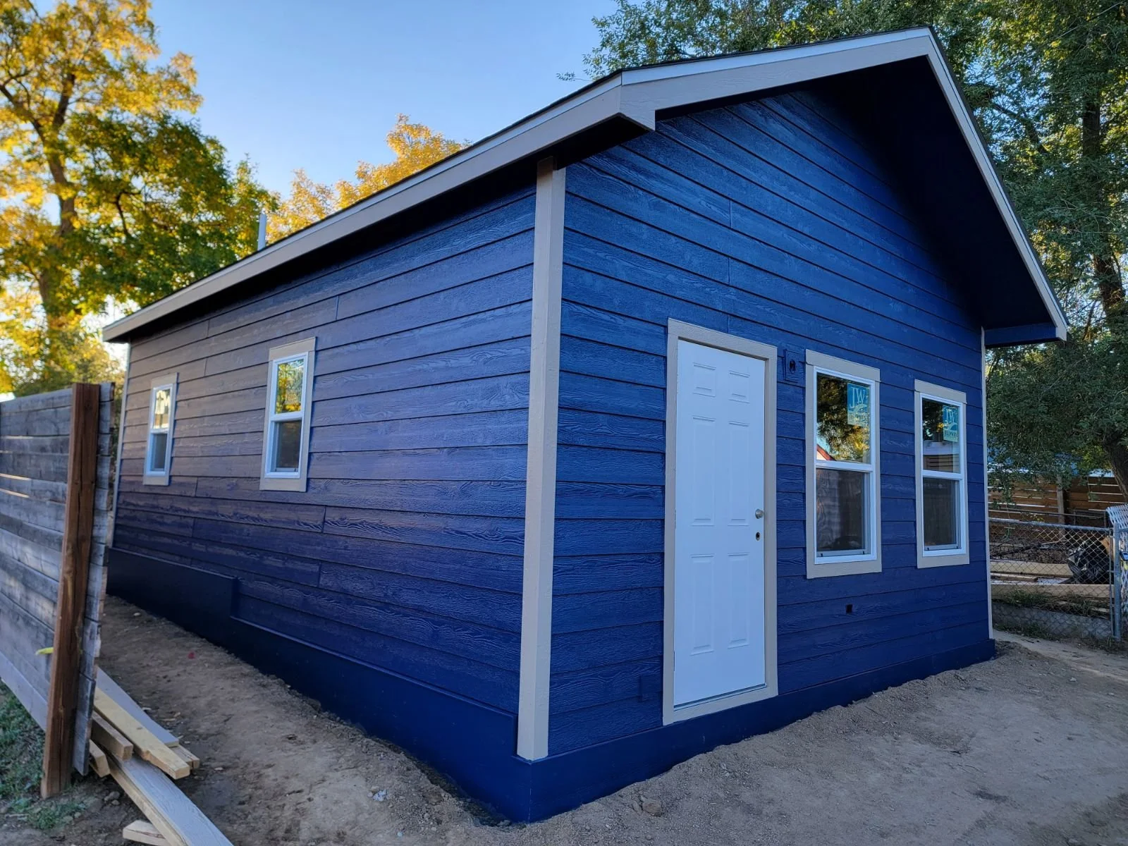 Side elevation of a completed detached accessory dwelling unit in Denver, featuring durable siding and clean architectural detailing by Prenvalley Builders.