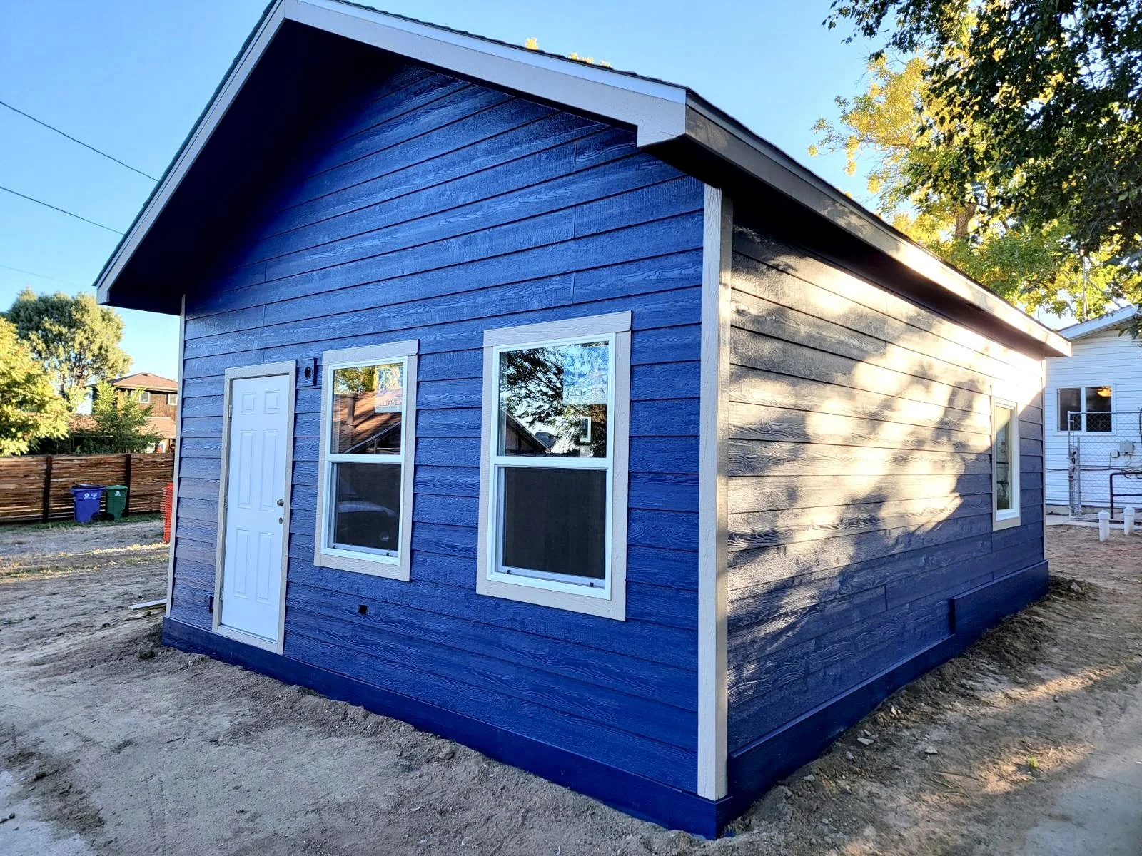 Completed detached accessory dwelling unit in a Denver neighborhood, featuring a compact modern exterior designed and built by Prenvalley Builders.