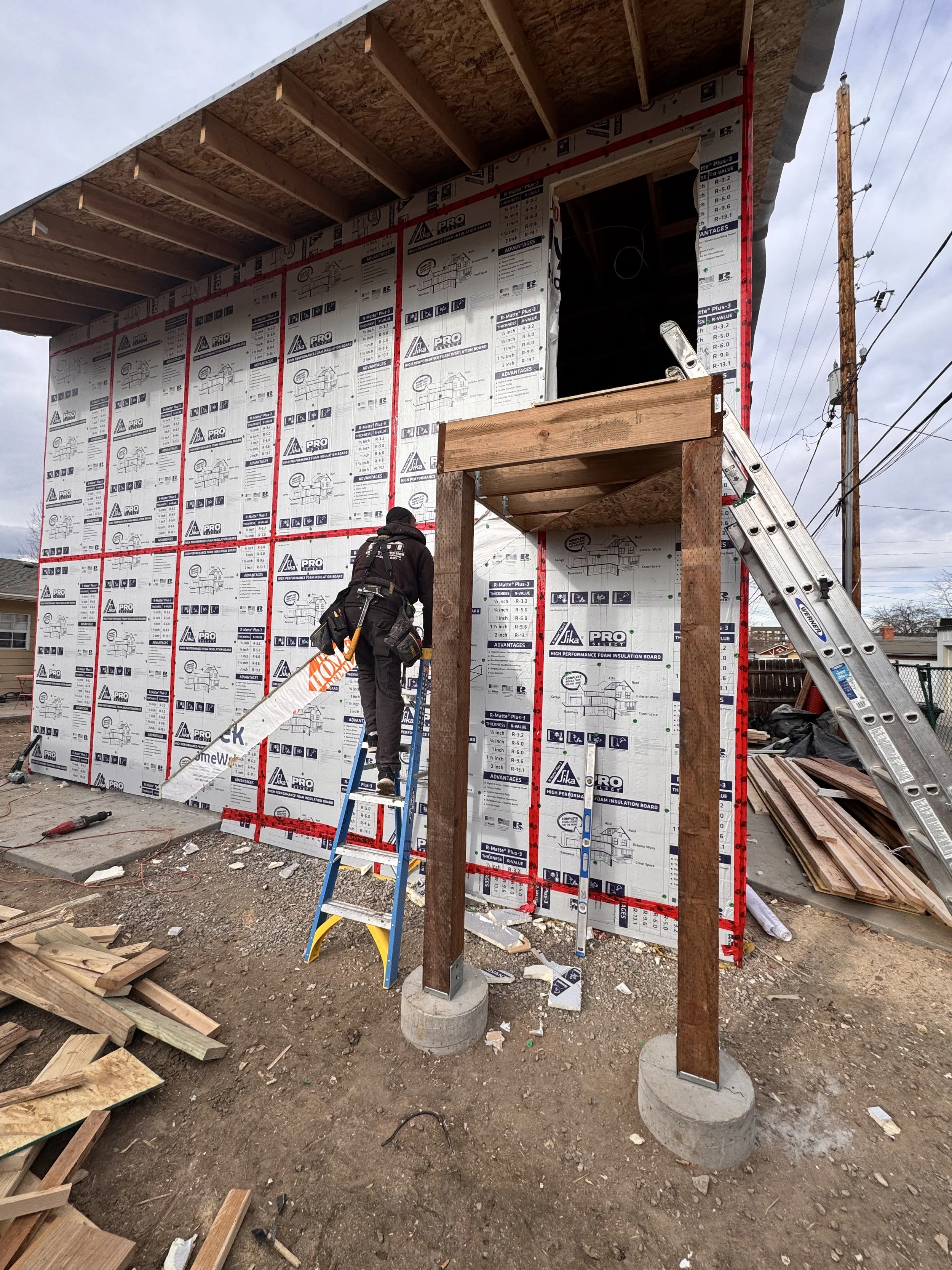 Exterior insulation and air-sealing installation on a detached accessory dwelling unit built by Prenvalley Builders in Denver, Colorado.