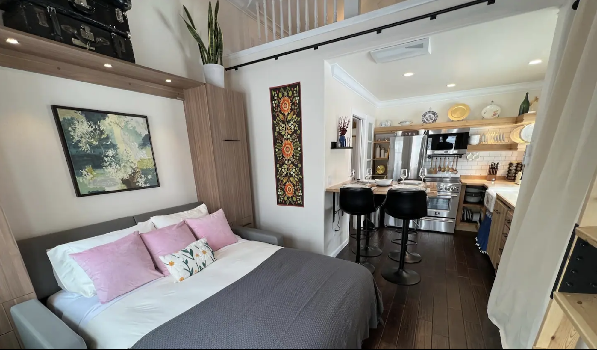 Completed studio-style interior of a detached accessory dwelling unit in Denver, Colorado, built by Prenvalley Builders, featuring an open living and kitchen area with efficient space planning.