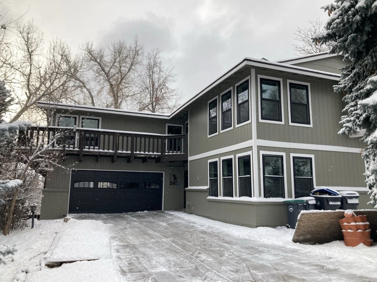 After photo of a renovated two-story home exterior following a full interior renovation in Golden, Colorado by Prenvalley Builders.
