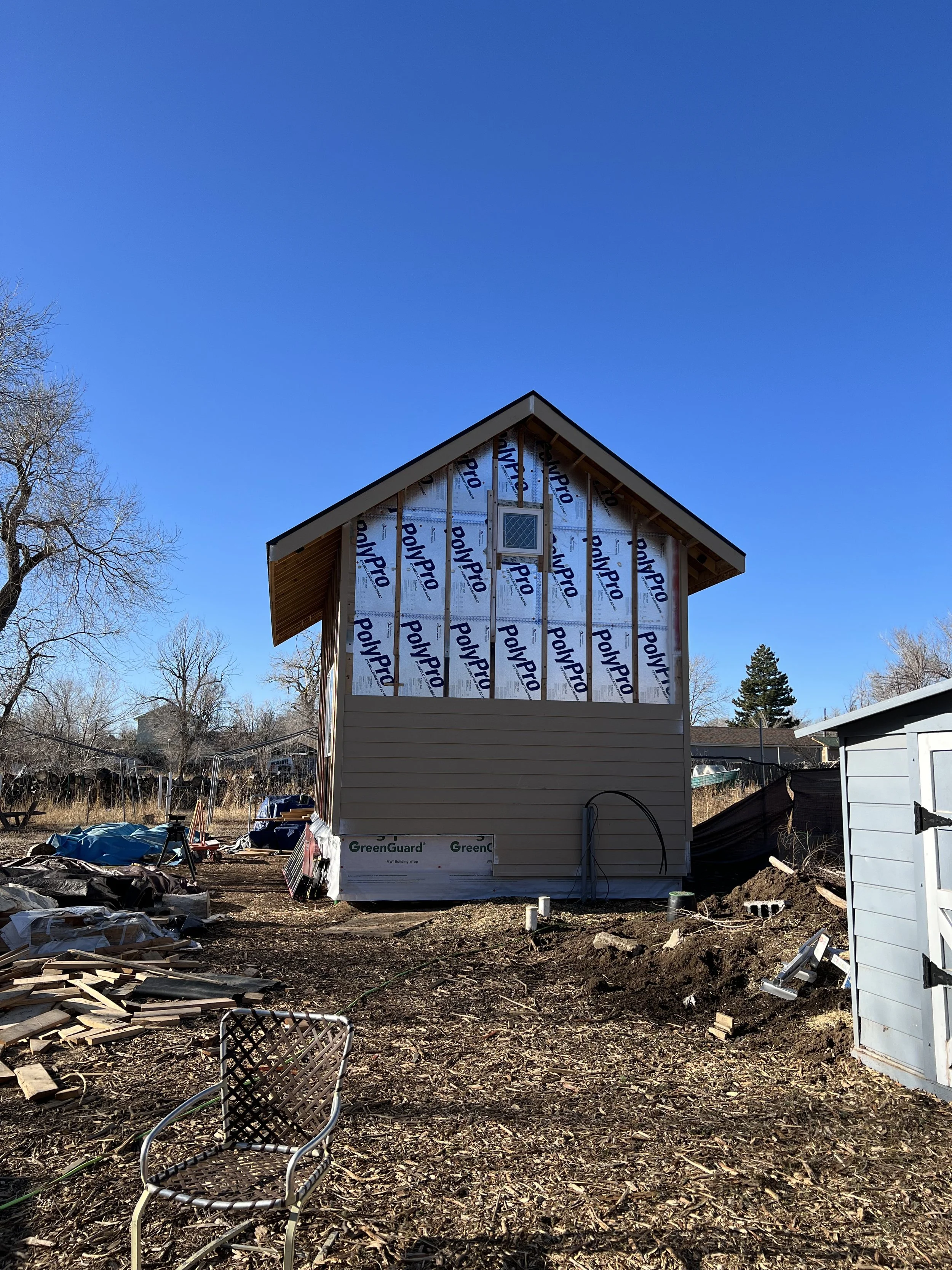 Exterior wall sheathing and partial siding installation on a detached accessory dwelling unit in Denver, Colorado, built by Prenvalley Builders during the construction phase.