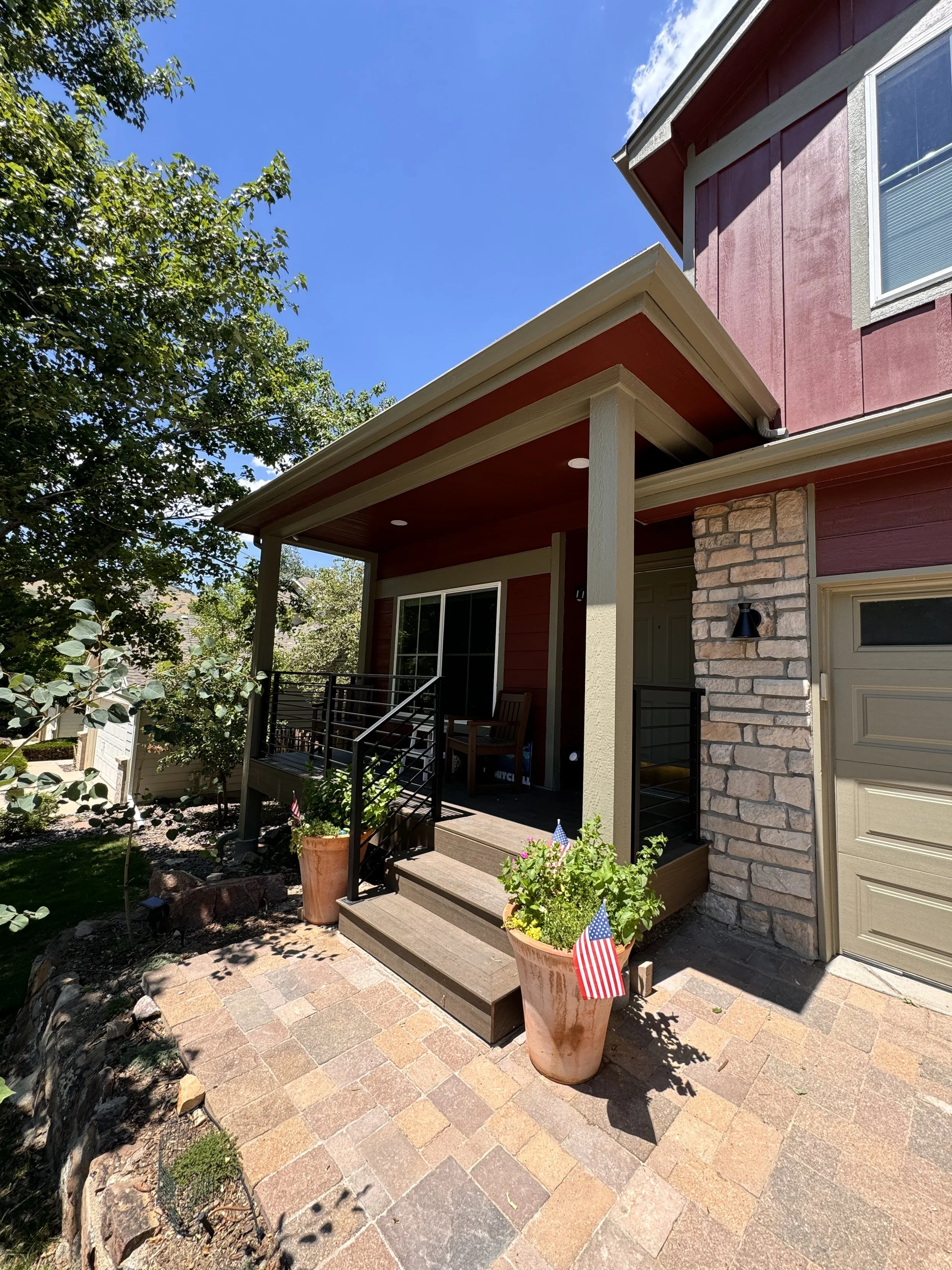 New covered front porch addition as part of a pop-top renovation in Golden, Colorado, enhancing the home’s entry and outdoor living space.