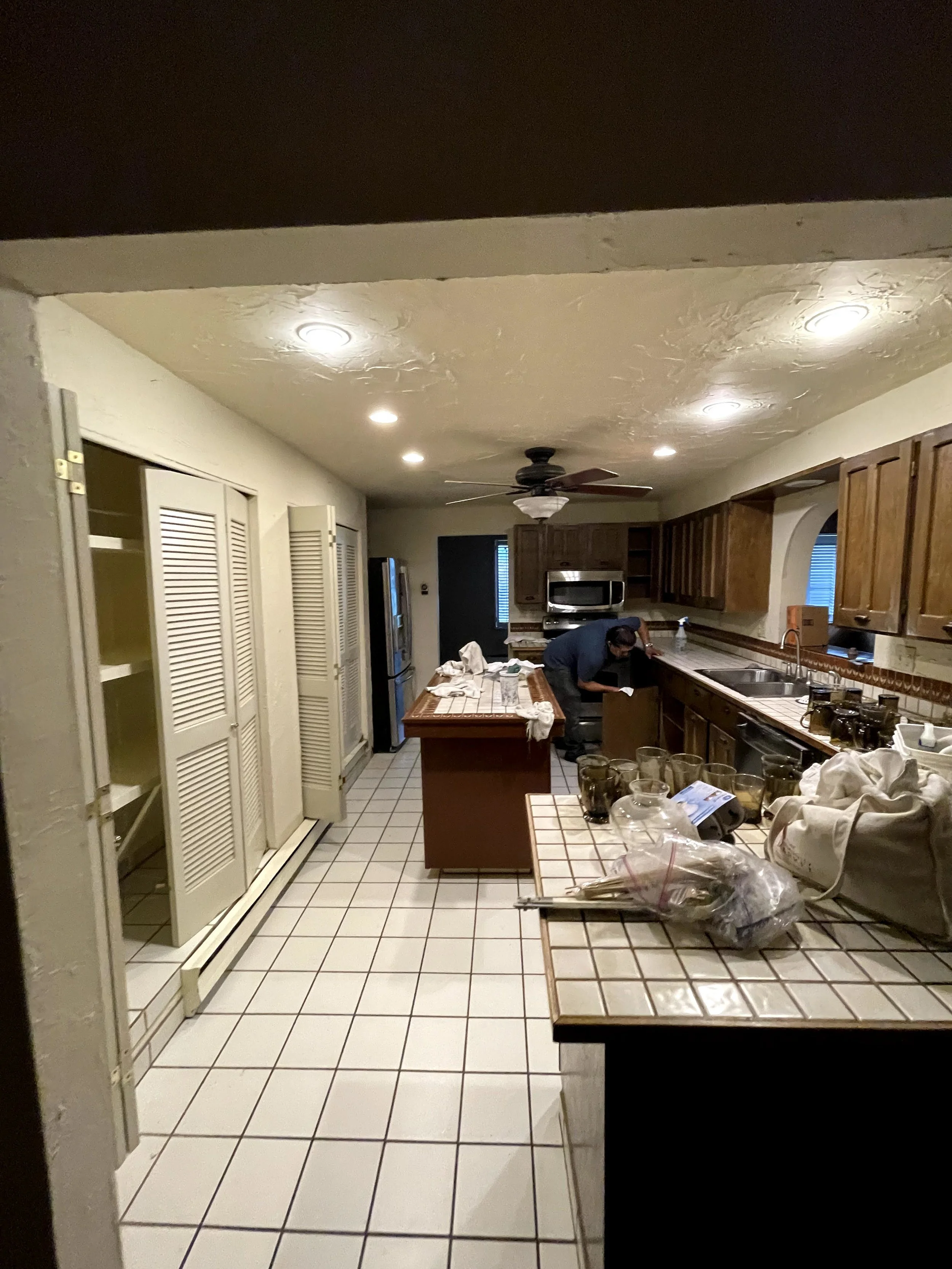 Before photo of an existing kitchen prior to a full interior renovation in Golden, Colorado by Prenvalley Builders.