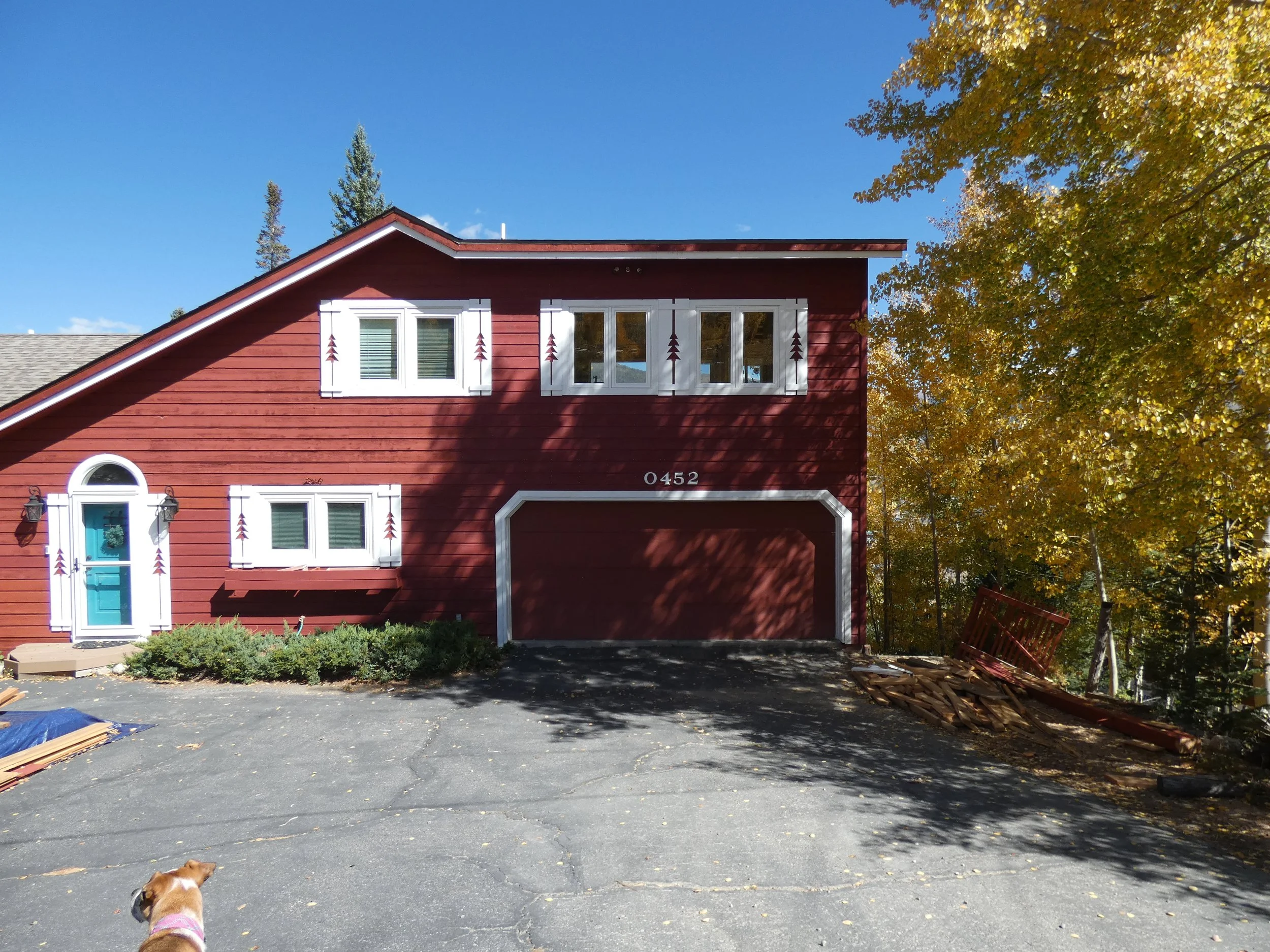 Finished exterior of a Silverthorne pop-top renovation featuring a completed second-story addition above an existing garage, expanding upper-level living space in a mountain home built by Prenvalley Builders.