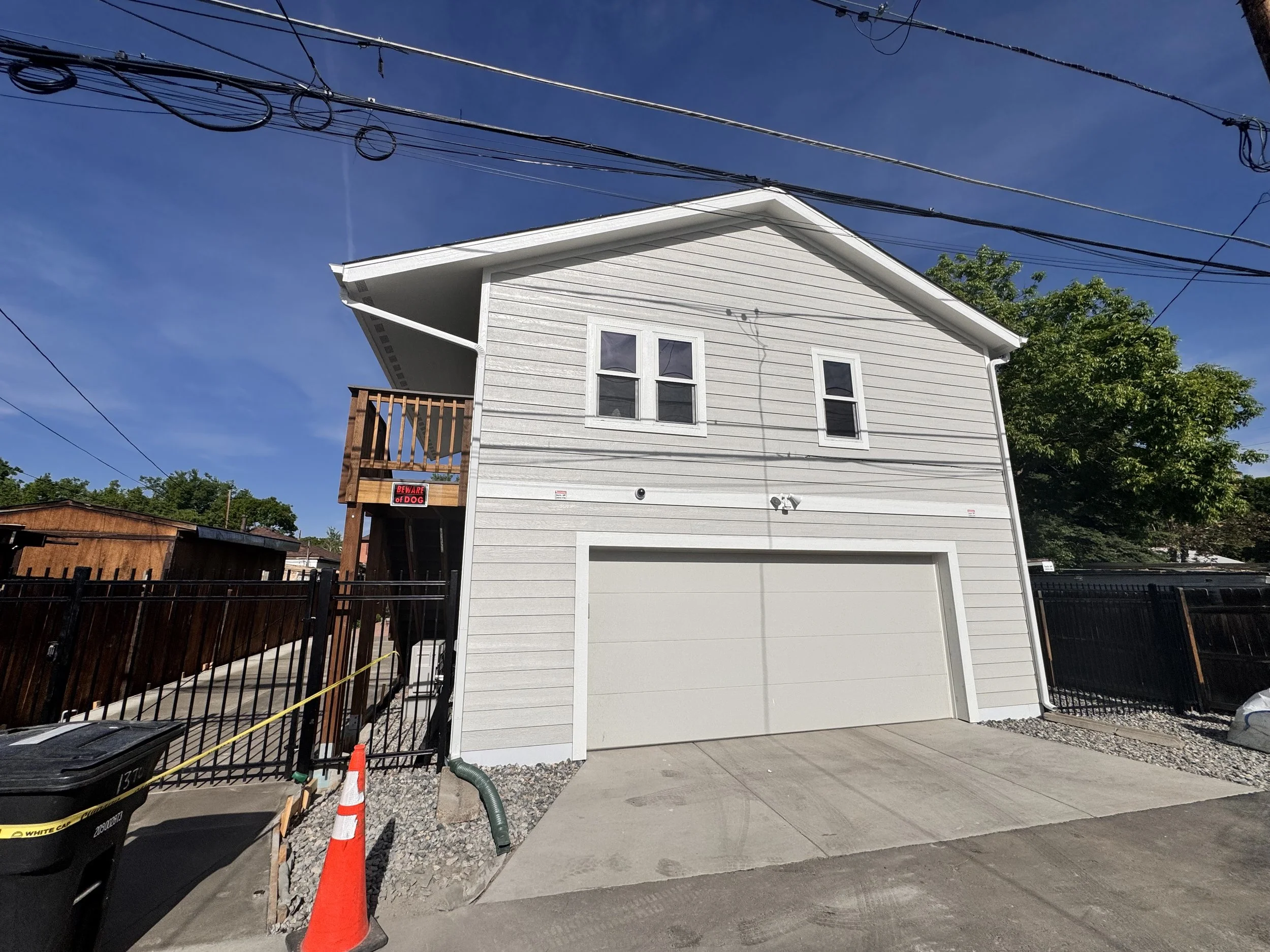 Completed accessory dwelling unit with integrated garage and alley access, built by Prenvalley Builders in Denver, Colorado.