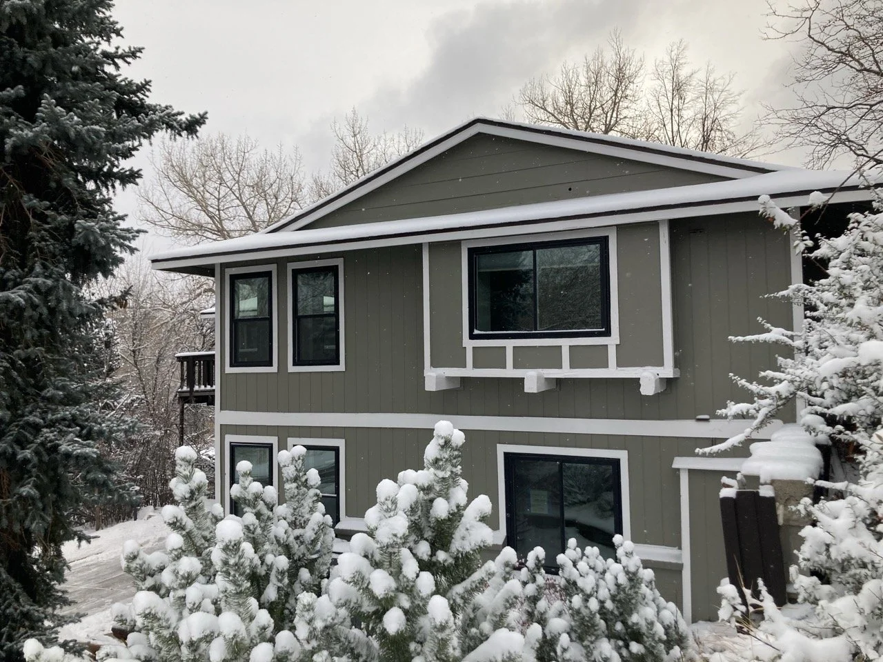After photo of the rear exterior of a home following a full interior renovation in Golden, Colorado by Prenvalley Builders.