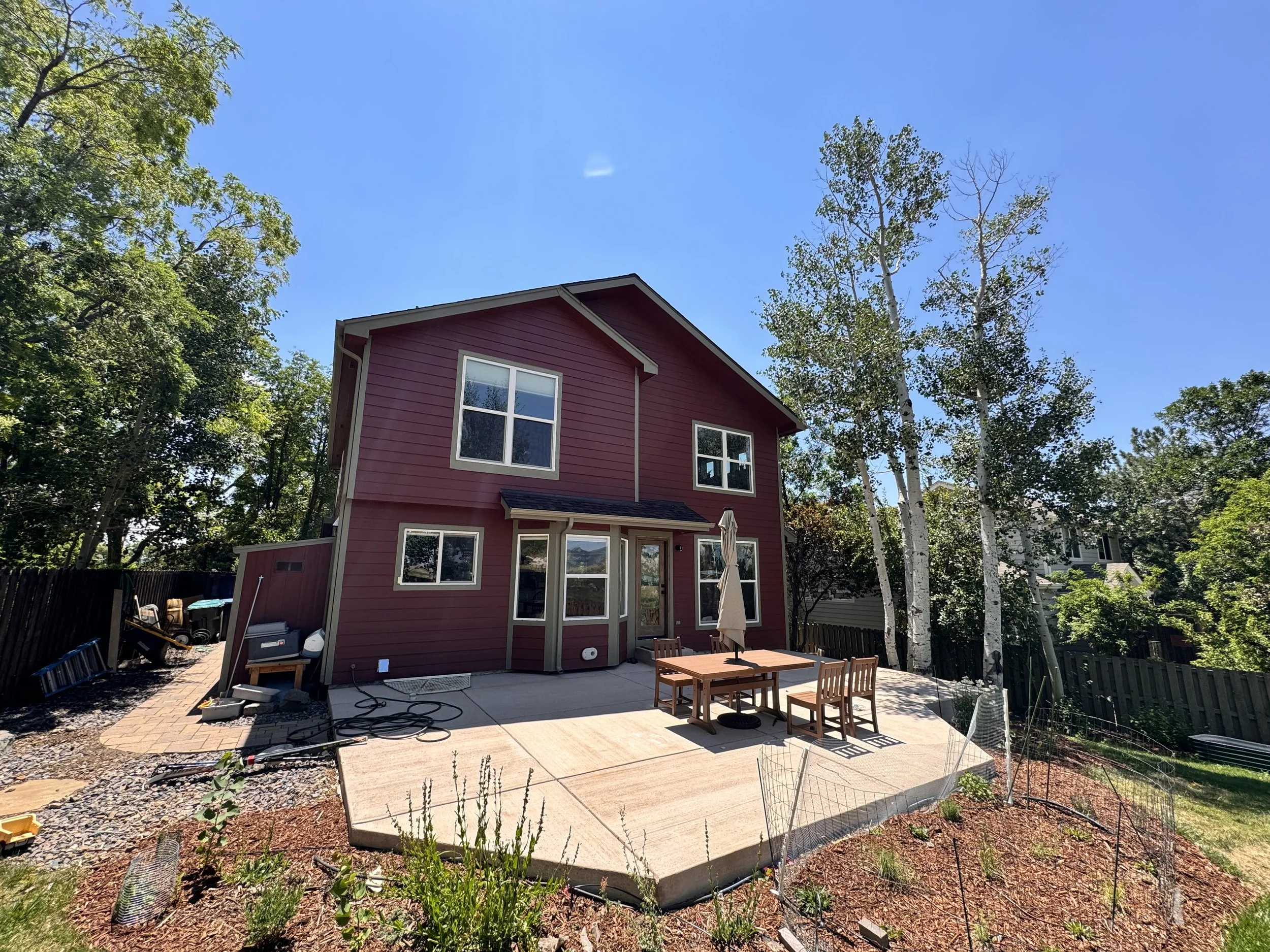 Completed pop-top renovation in Golden, Colorado, featuring a finished partial second-story addition seamlessly integrated with the existing home.