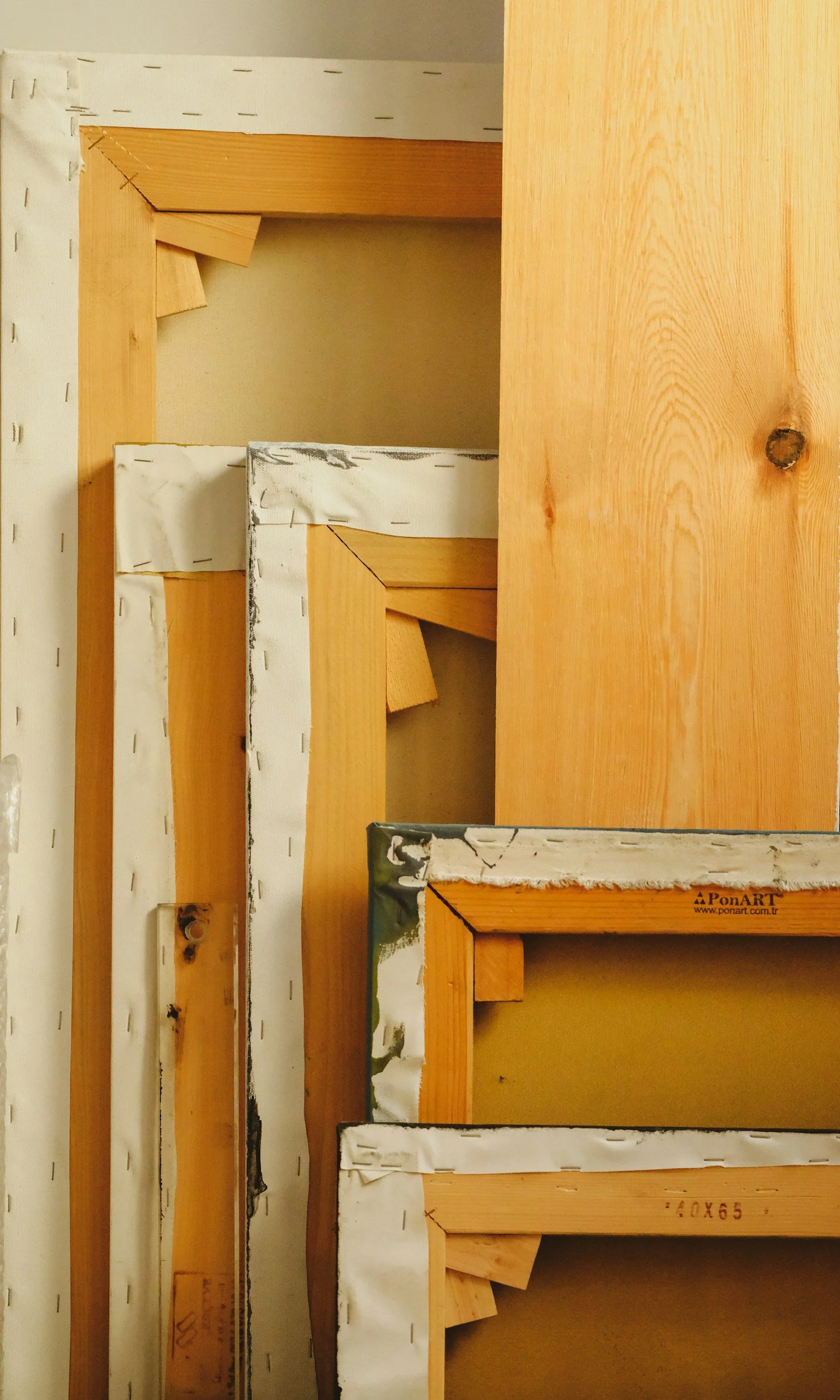 Professional grade canvases and stretcher bars of varying sizes (1.5" or 1.75")