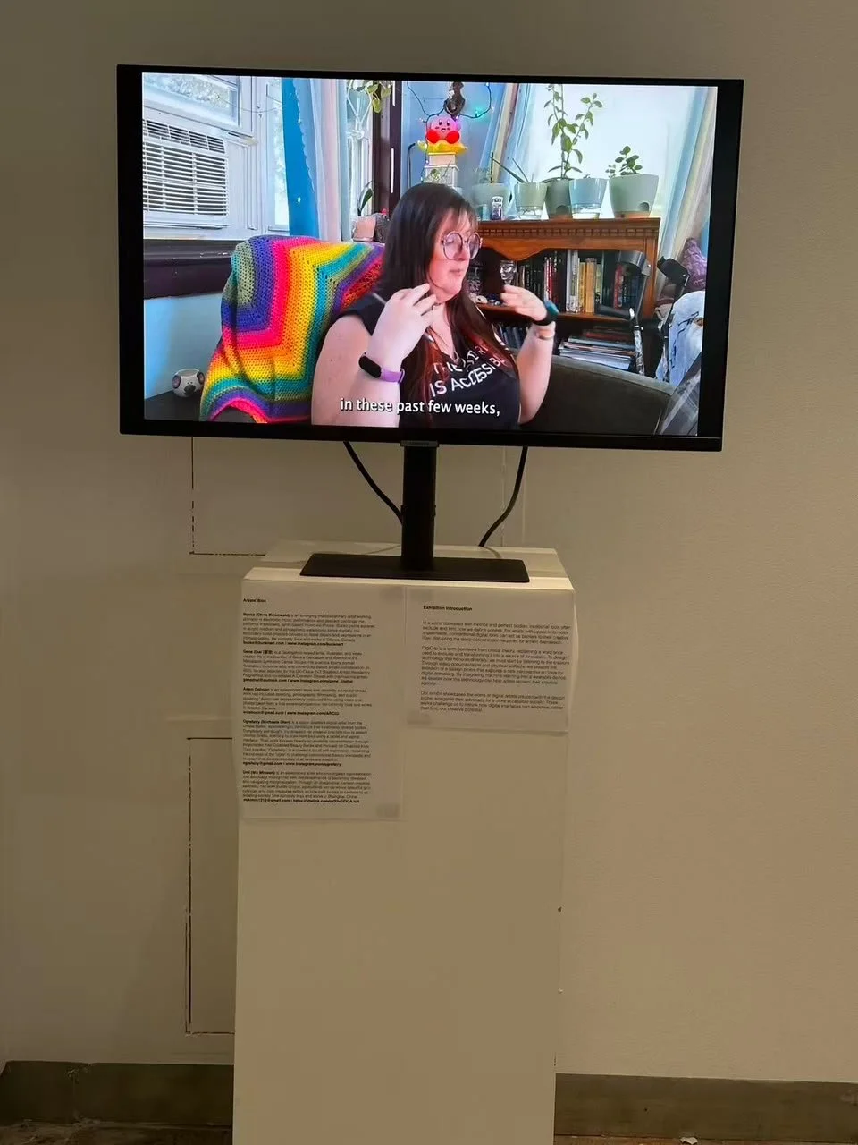 a photo of the screen that was playing the video about the DigiCrip. The screen is currently on a part of the video where I am speaking