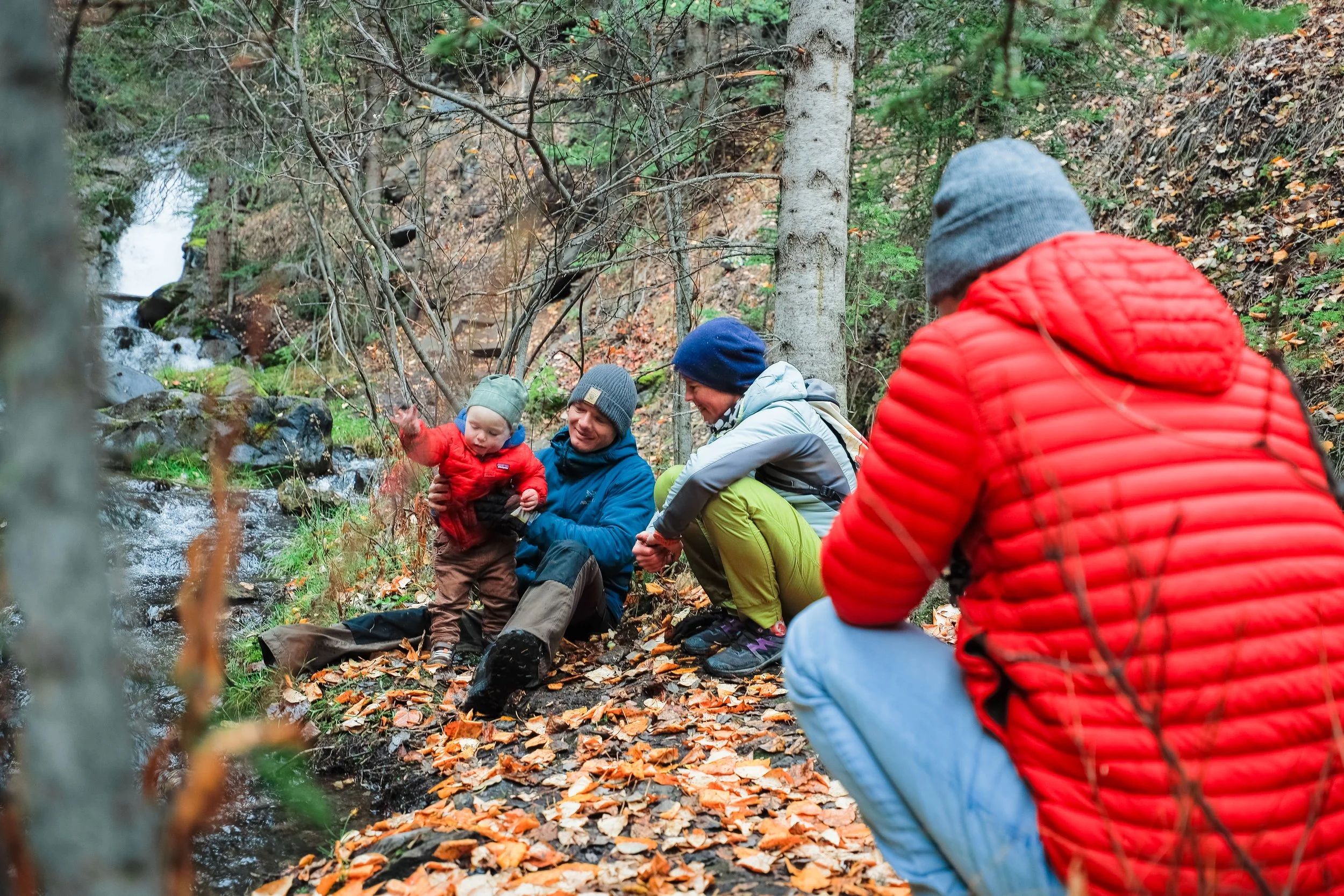 Matt and his family by the creek