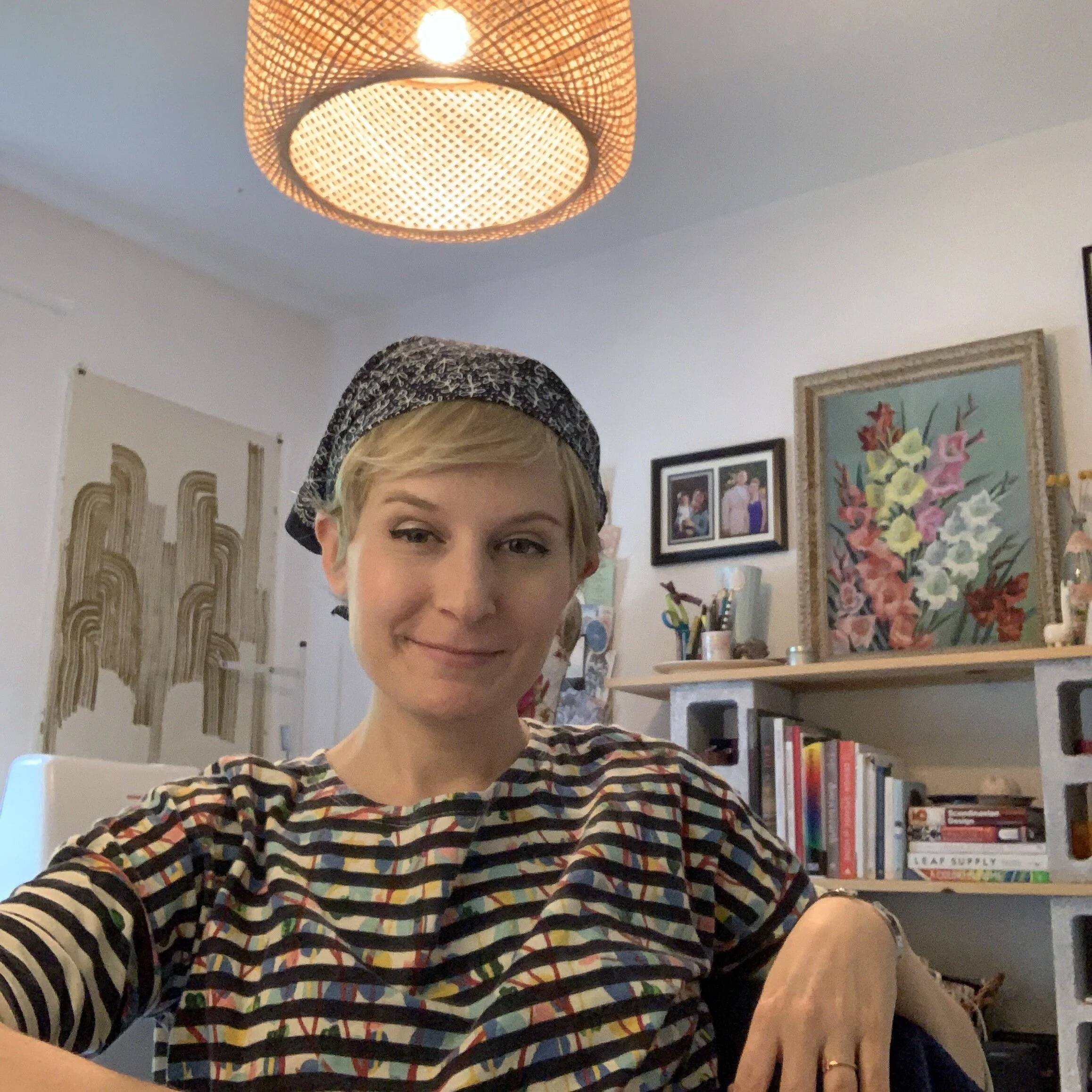 Getting ready for a zoom call with my freelance clients. This wig needed a cut so I styled it with my favorite bandana. I was going through cancer treatment during the Covid pandemic so there were no trips to the salon at that time. 