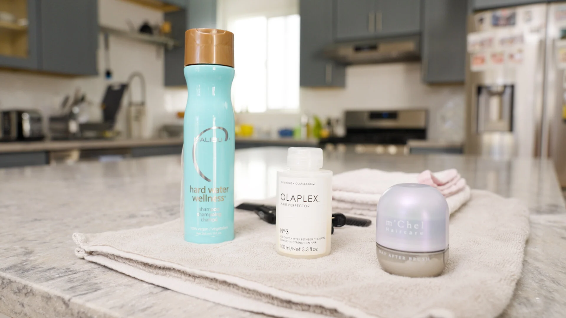   1 - Malibu hard water wellness shampoo ​     2 - OLAPLEX hair perfector No. 3  ​    3 - m'Chel Haircare Day After Brush ​   