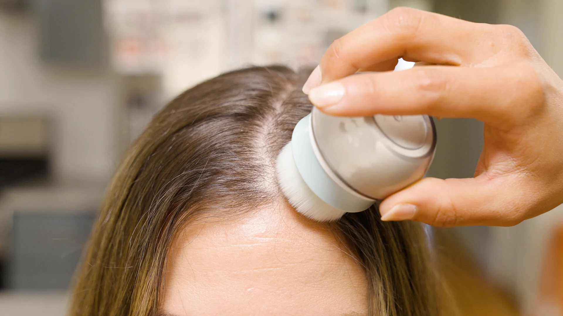  Start from front to back and apply the  m’Chel Haircare Day After Brush  dry shampoo throughout the whole head of hair. 