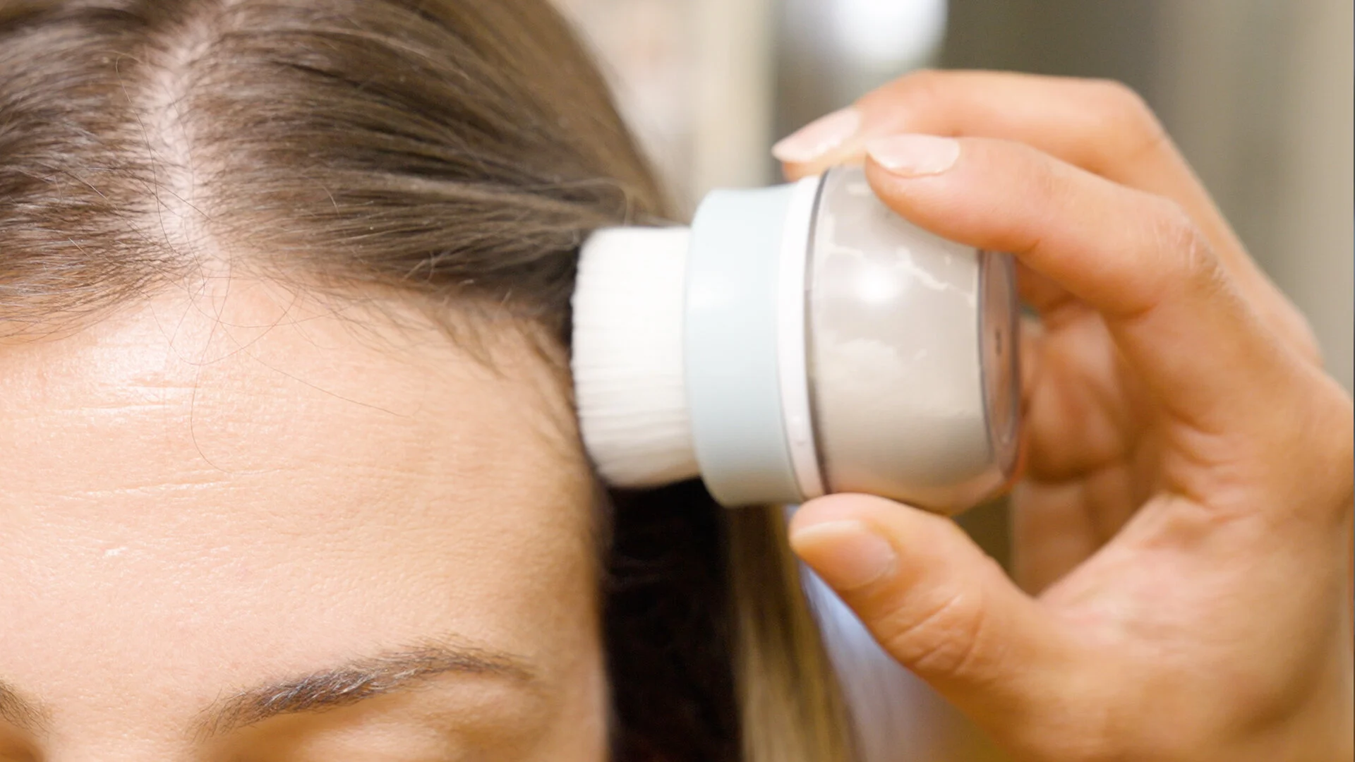 Start from front to back and apply the  m’Chel Haircare Day After Brush  dry shampoo throughout the whole head of hair. 