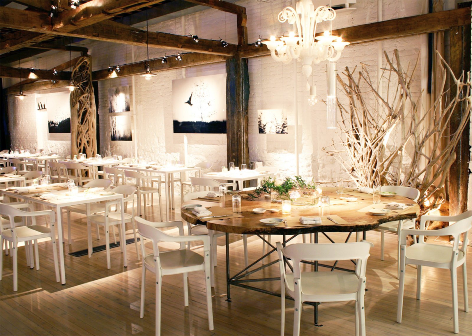 Restaurant with white furniture and bright lights
