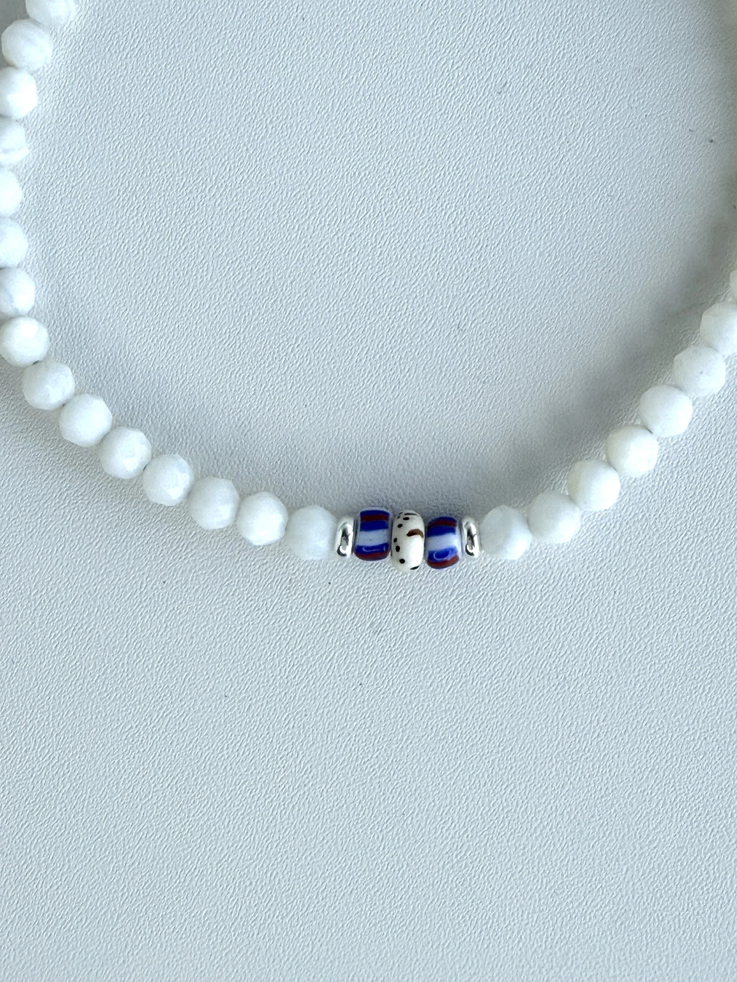 bracelet-homme- perle-nacre-made-in-france-graine-lotus.jpg