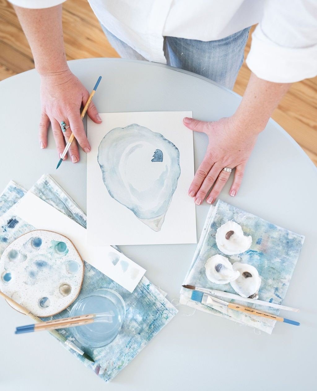 🌊 Dive into coastal elegance with our Gilded Seascapes Collection! ⁠
⁠
Featuring stunning decoupage oyster jewelry dishes adorned with Laura Lobdell's mesmerizing watercolors, each piece is a unique ode to the Coastal Carolinas. Perfect for beach lo